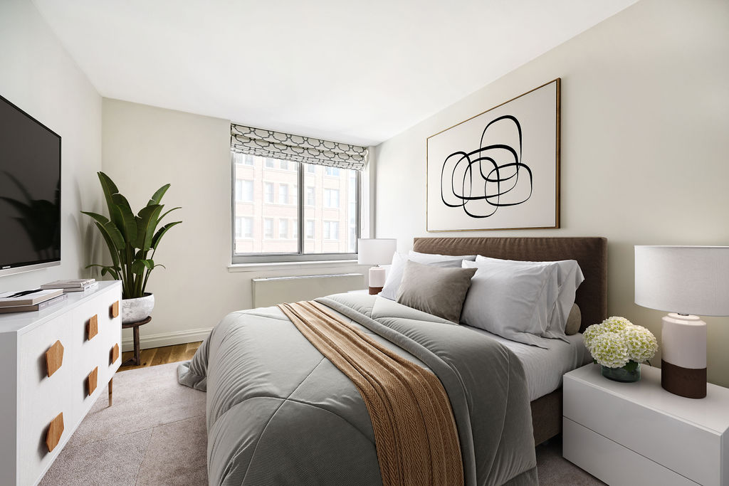 520 West 23rd Street, Unit 8C Manhattan, NY 10011 - Photo 3 of 10 a bedroom with a bed and a window