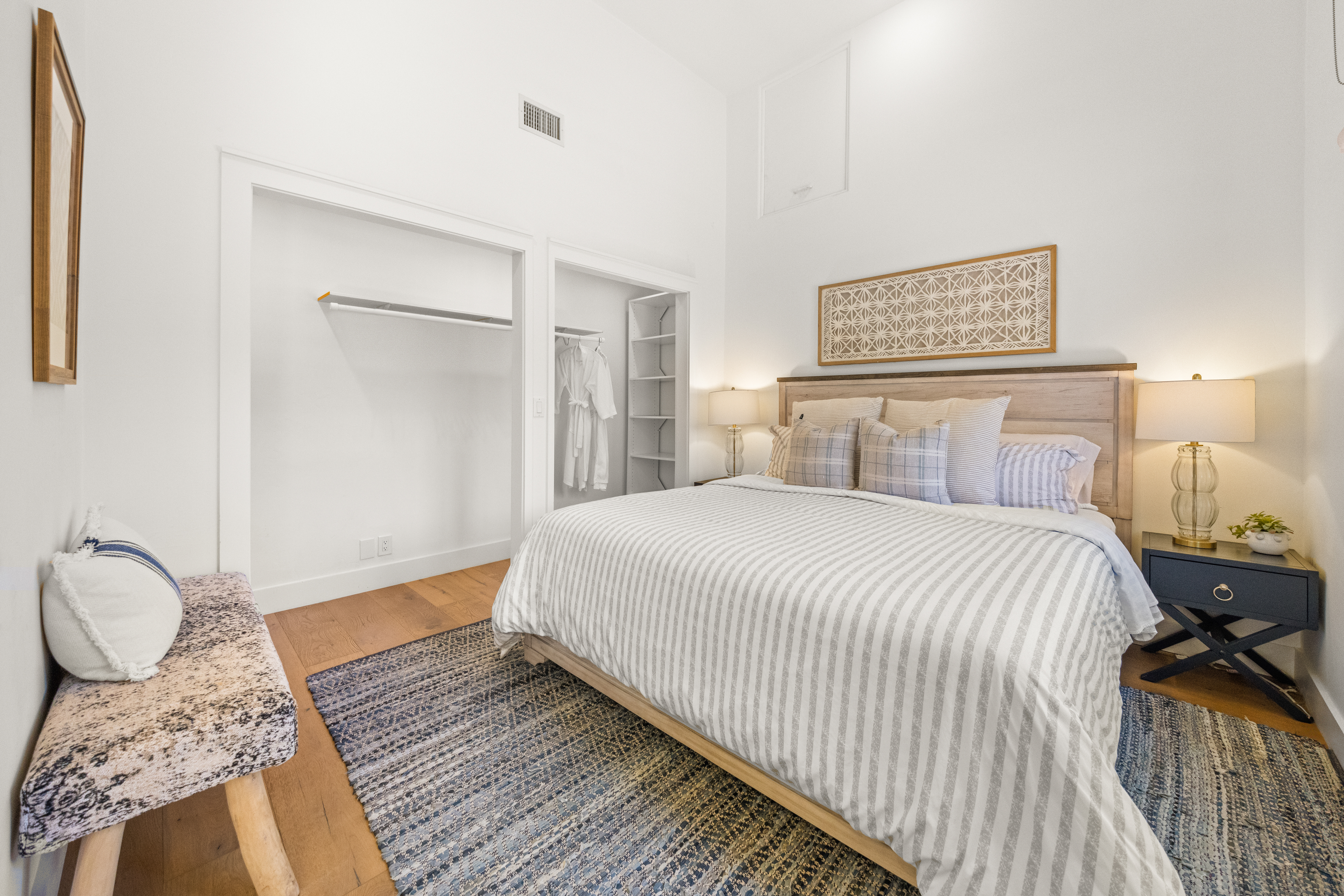 161 Loureyro Road Montecito, CA 93108 - Photo 12 of 52 a bedroom with a bed and wooden floor