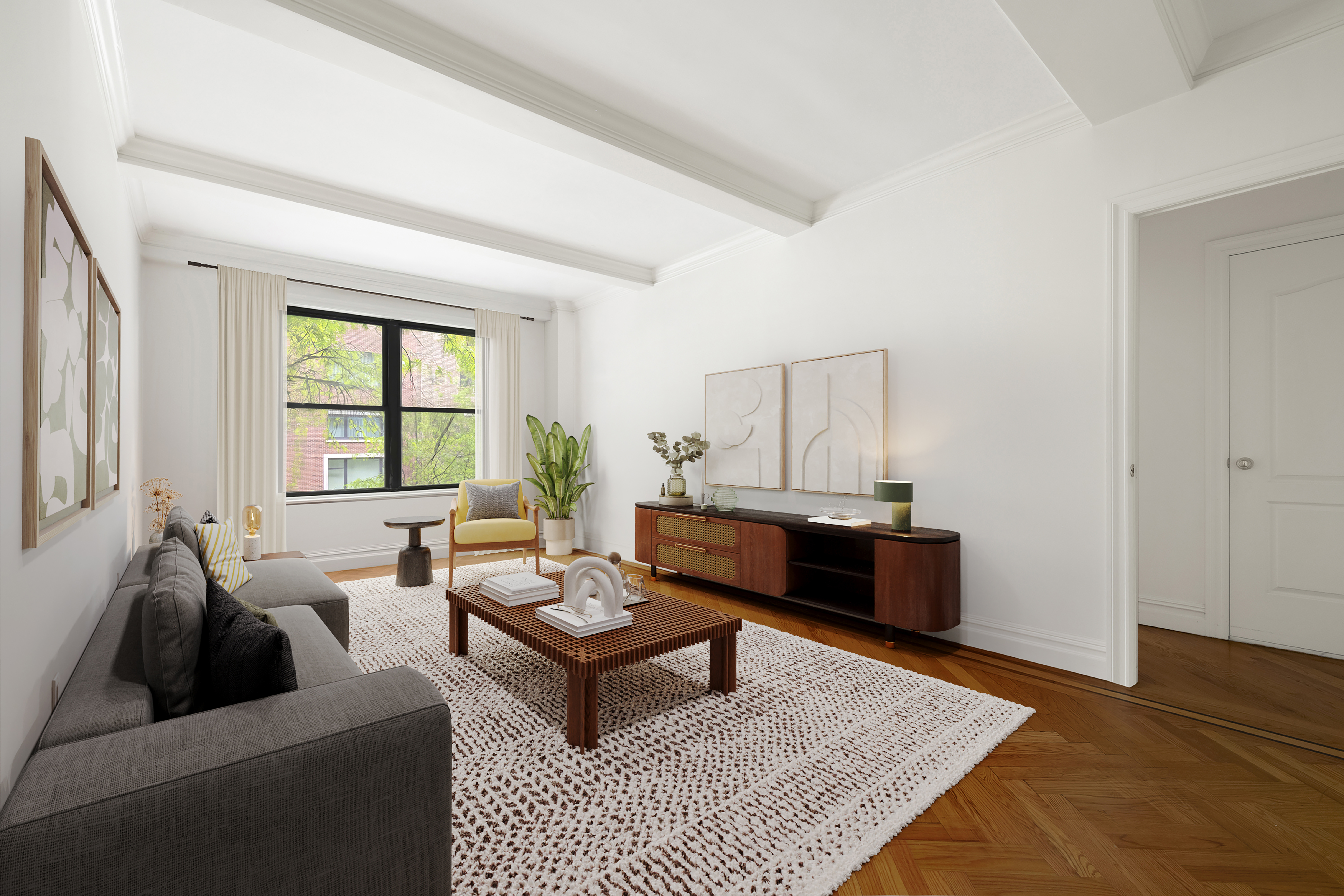 a living room with furniture and a window