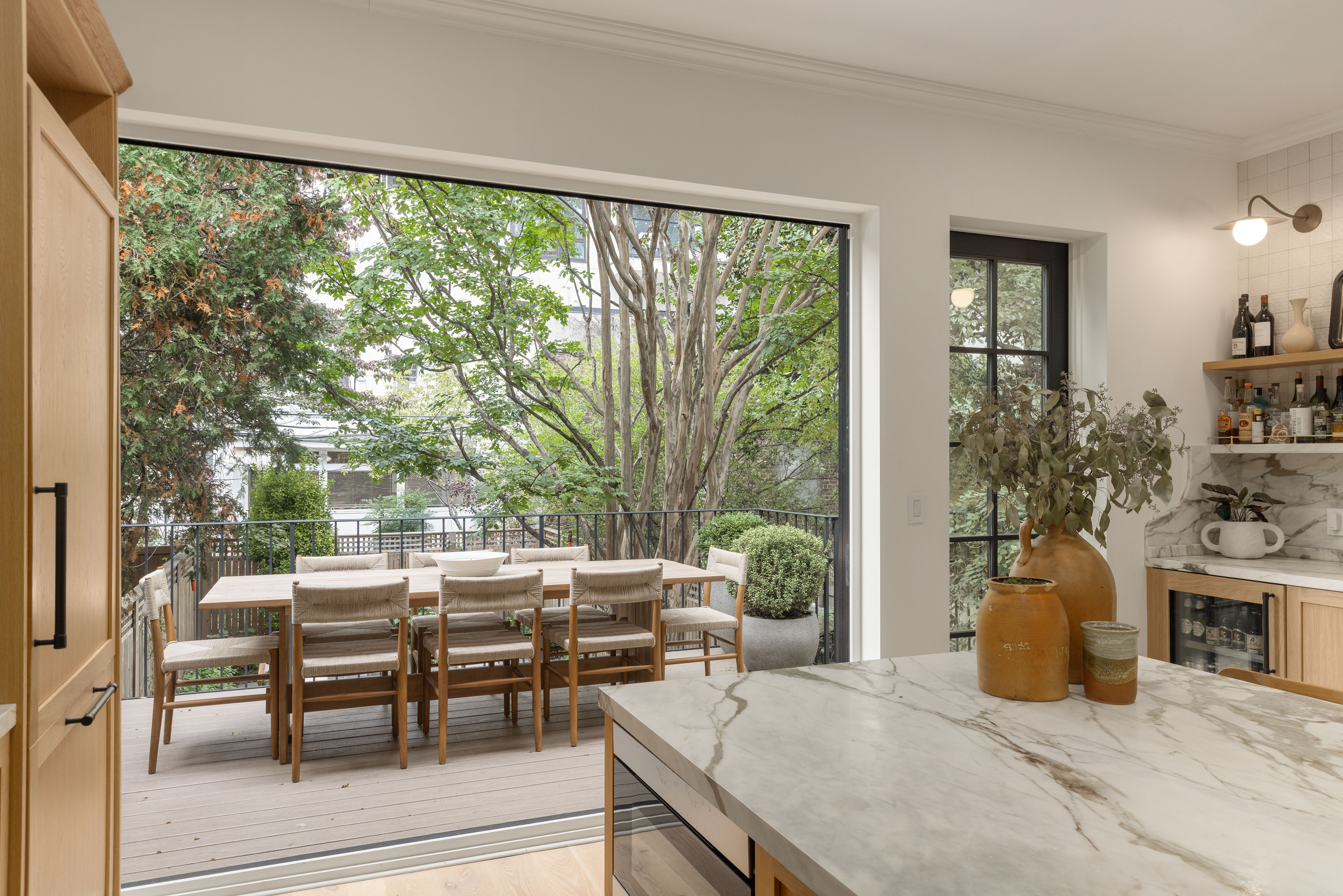 309 Pacific Street Brooklyn, NY 11201 - Photo 4 of 22 a view of a dining room with furniture and chandelier