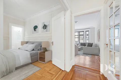 a living room with furniture and a couch