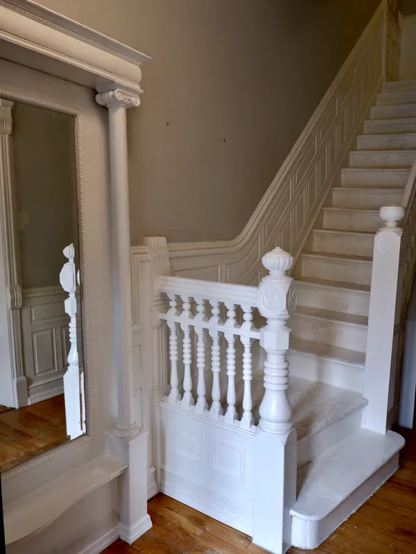 a view of entryway with wooden floor