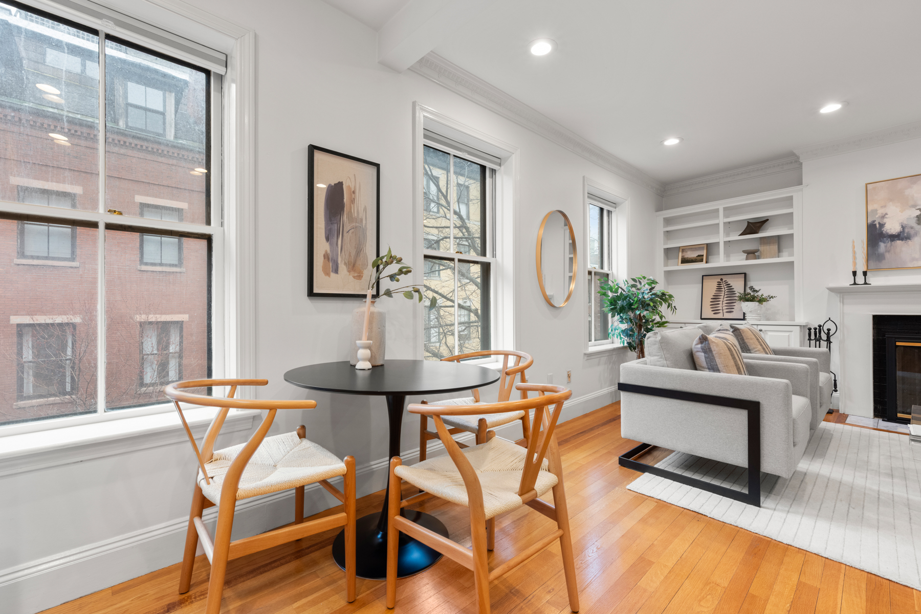 63 West Cedar Street, Unit 3 Boston, MA 02114 - Photo 6 of 17 a living room with fireplace furniture and a table