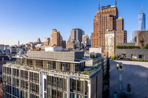 a city view with tall buildings