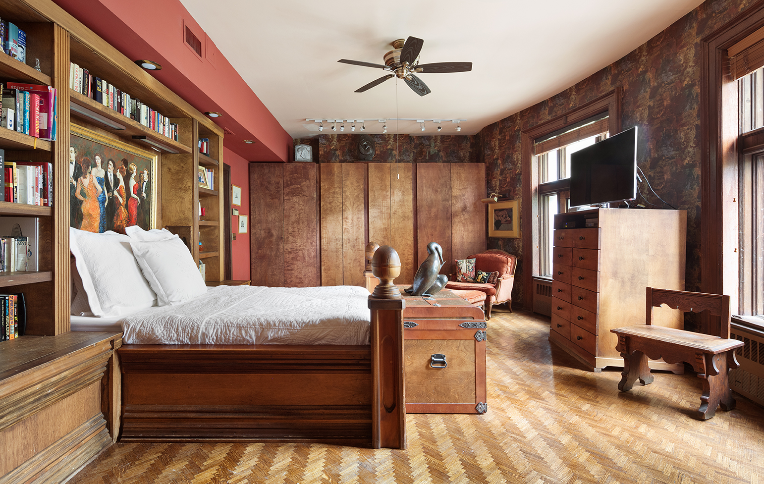 323 West 80th Street Manhattan, NY 10024 - Photo 15 of 24 a bedroom with furniture and a chandelier