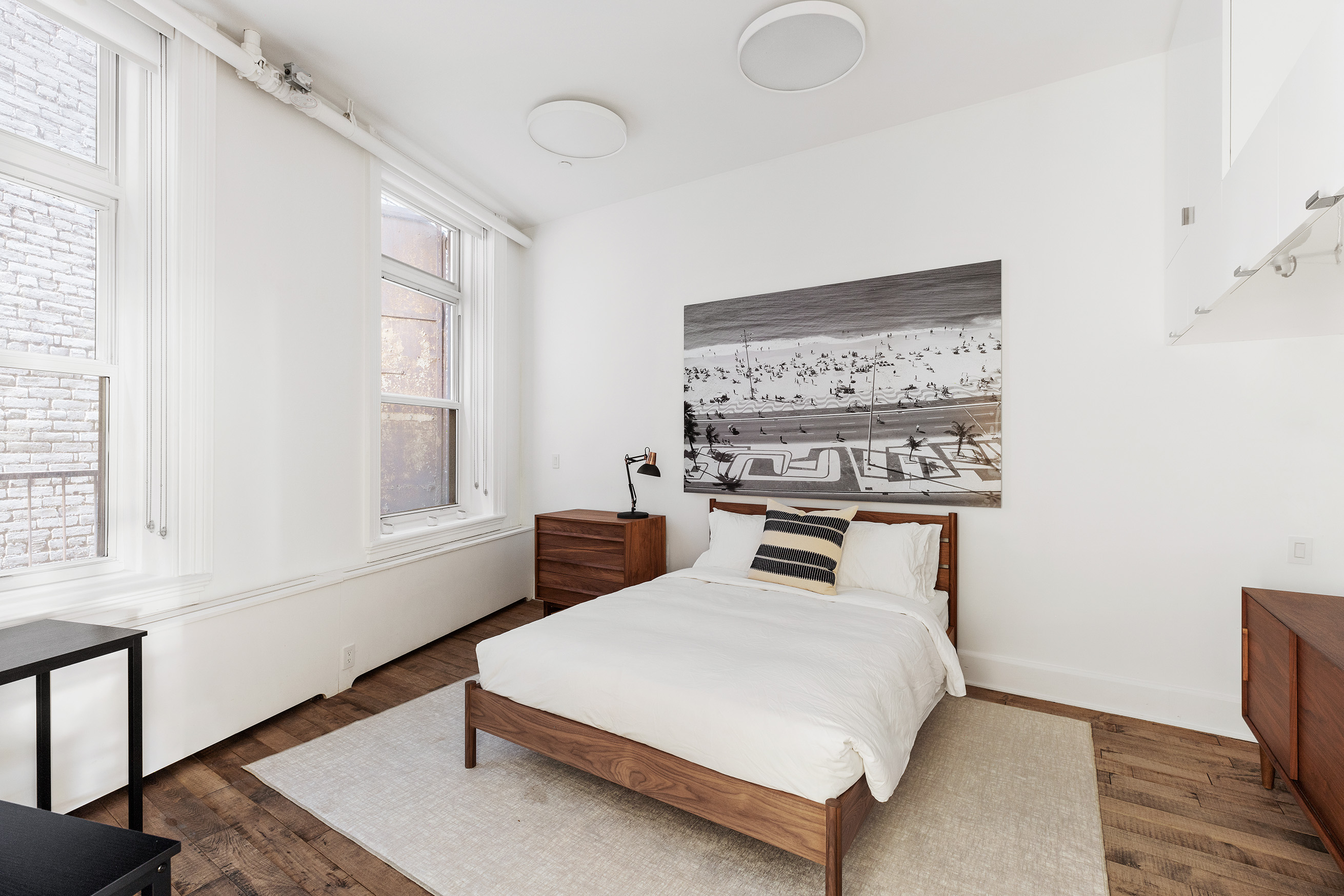 22 East 18th Street, Unit 4E Manhattan, NY 10003 - Photo 11 of 13 a bedroom with a bed and window