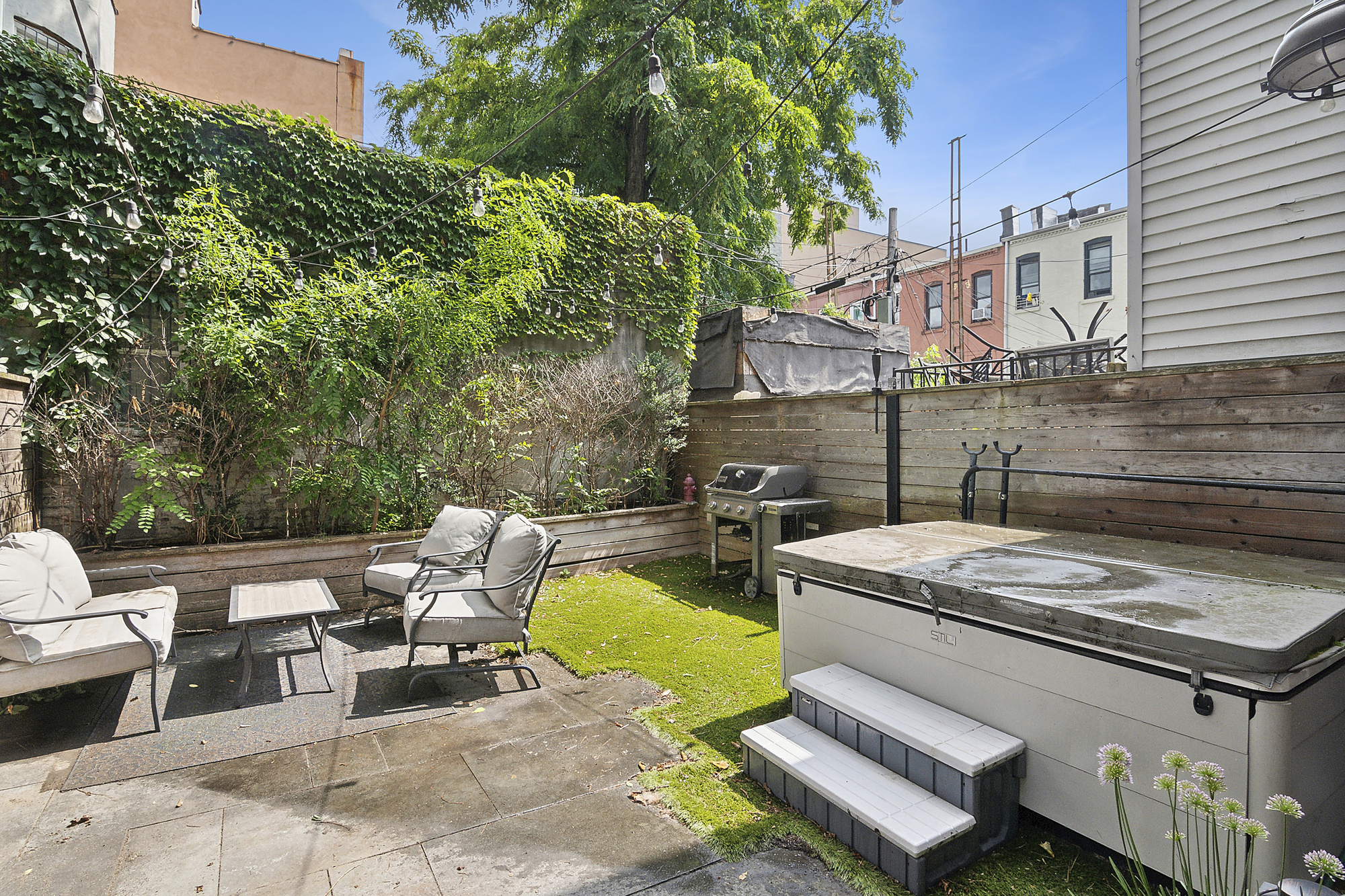 449 Evergreen Avenue, Unit 1 Brooklyn, NY 11221 - Photo 2 of 10 a view of a patio with swimming pool