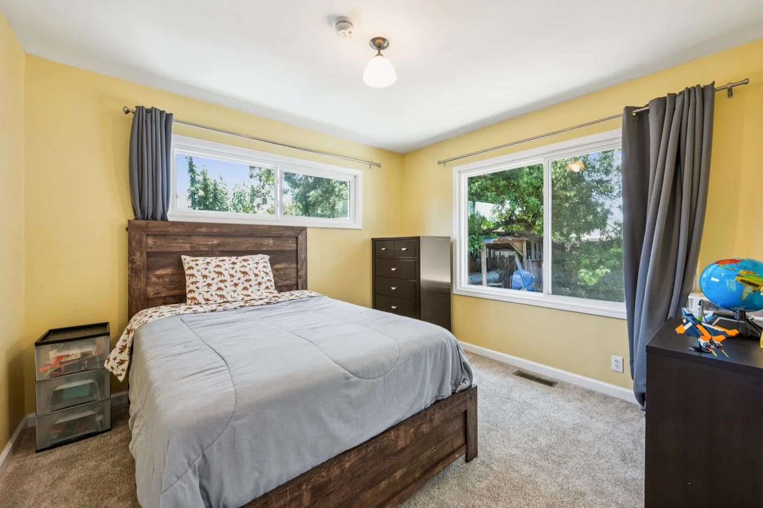 a backyard of a house with lots of green space