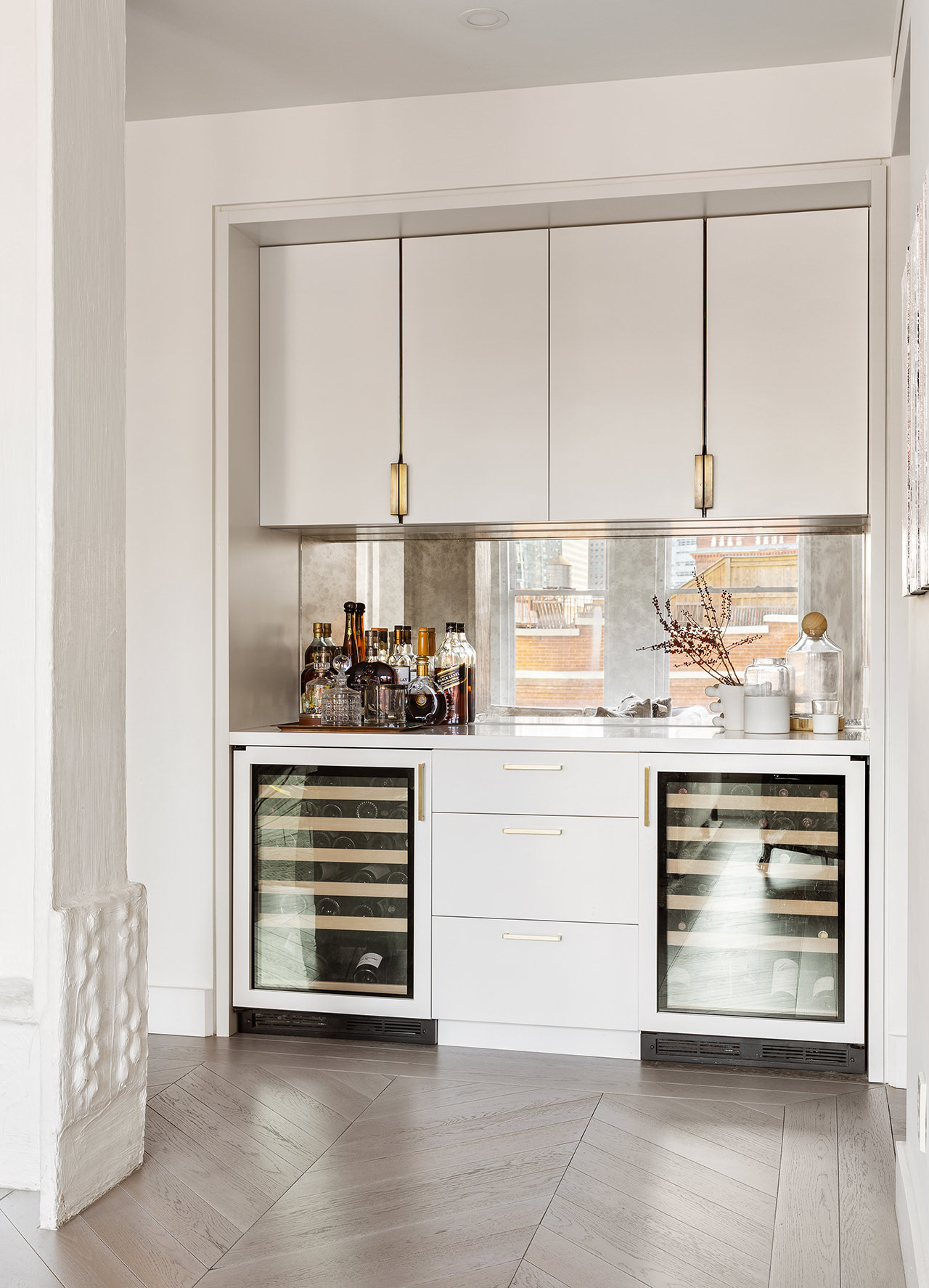 100 Hudson Street, Unit 7BC Manhattan, NY 10013 - Photo 6 of 20 a kitchen with appliances cabinets and a large window