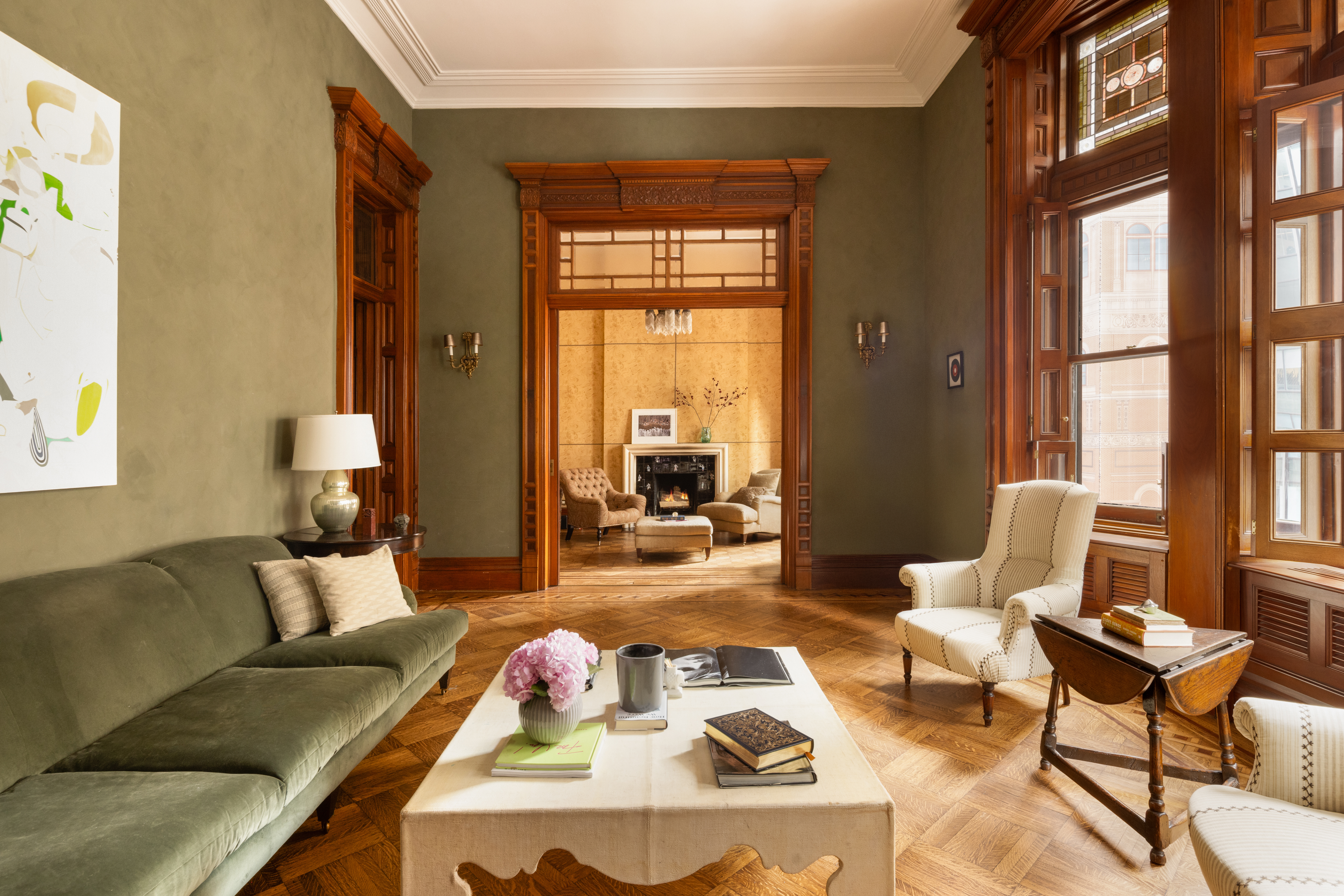 205 West 57th Street, Unit 4B Manhattan, NY 10019 - Photo 1 of 14 a living room with furniture and a large window