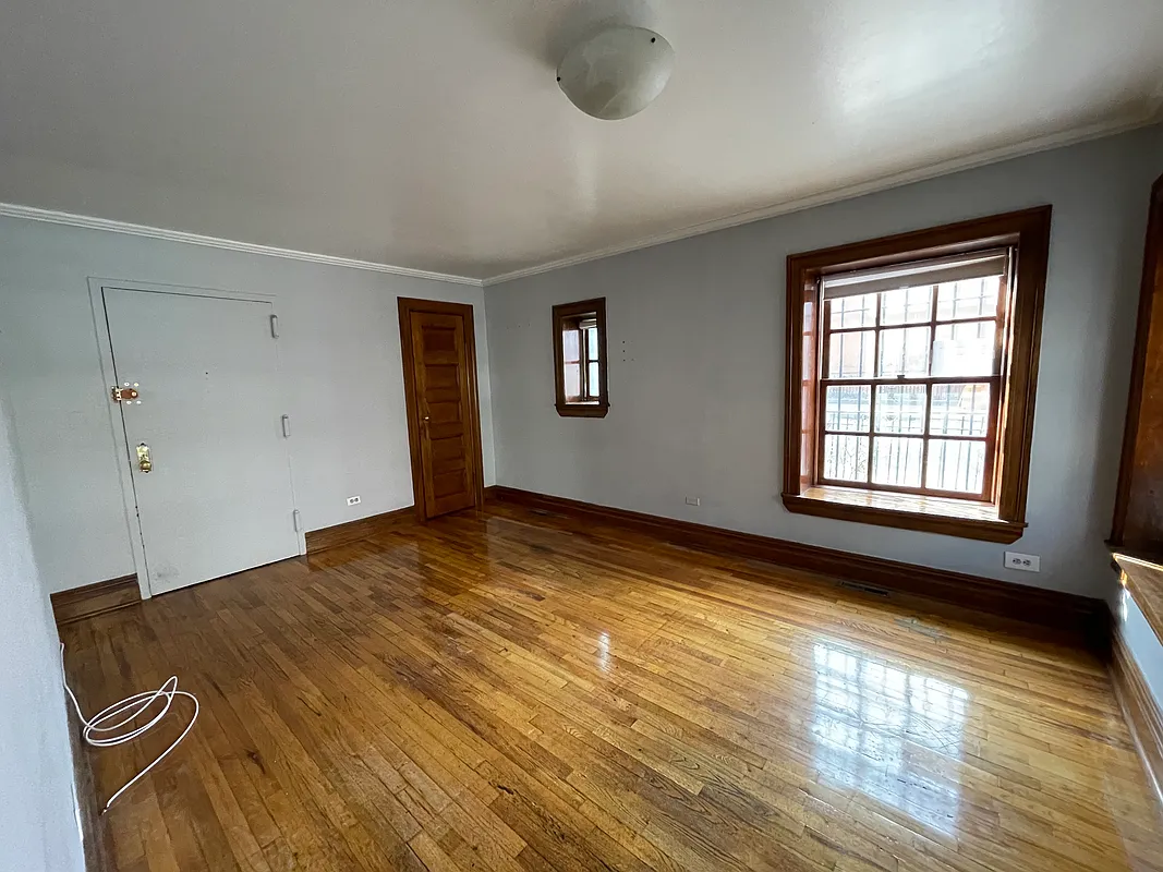 343 Carlton Avenue, Unit 1A Brooklyn, NY 11238 - Photo 2 of 6 a view of empty room with windows