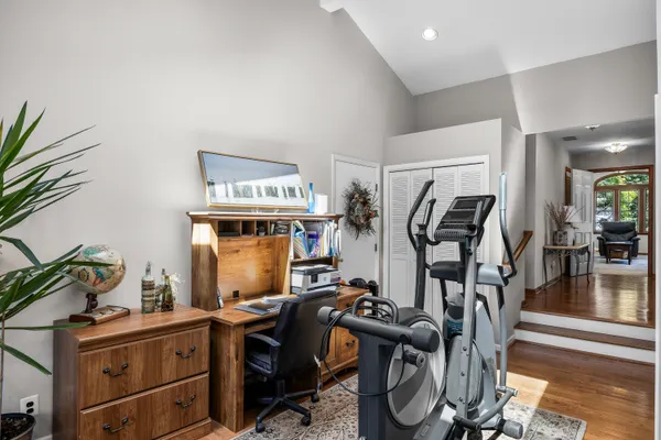 a bedroom with a bed and a walk in closet
