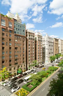 a view of a city with tall buildings