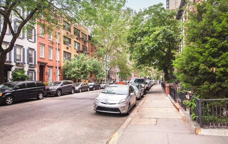 251 East 32nd Street, Unit 19F Manhattan, NY 10016 - Photo 7 of 13 a view of a street with cars parked