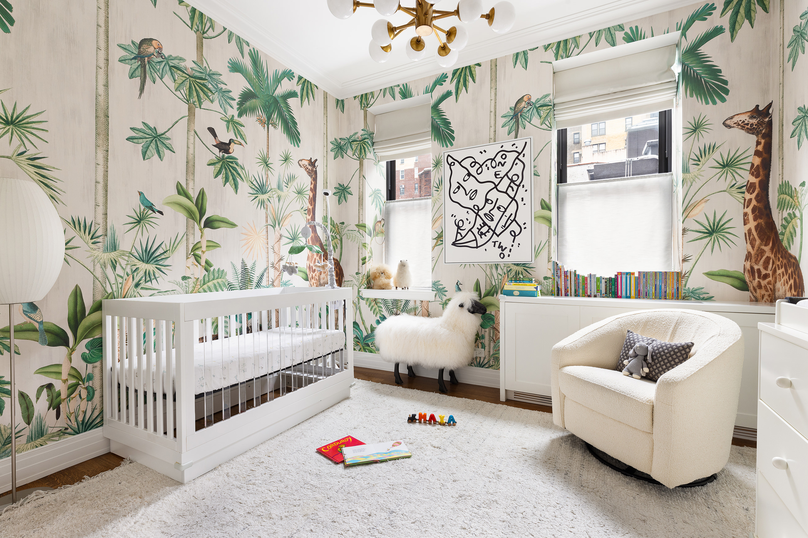 235 West 75th Street, Unit 505 Manhattan, NY 10023 - Photo 11 of 23 a white couch sitting next to a white bed and a white couch