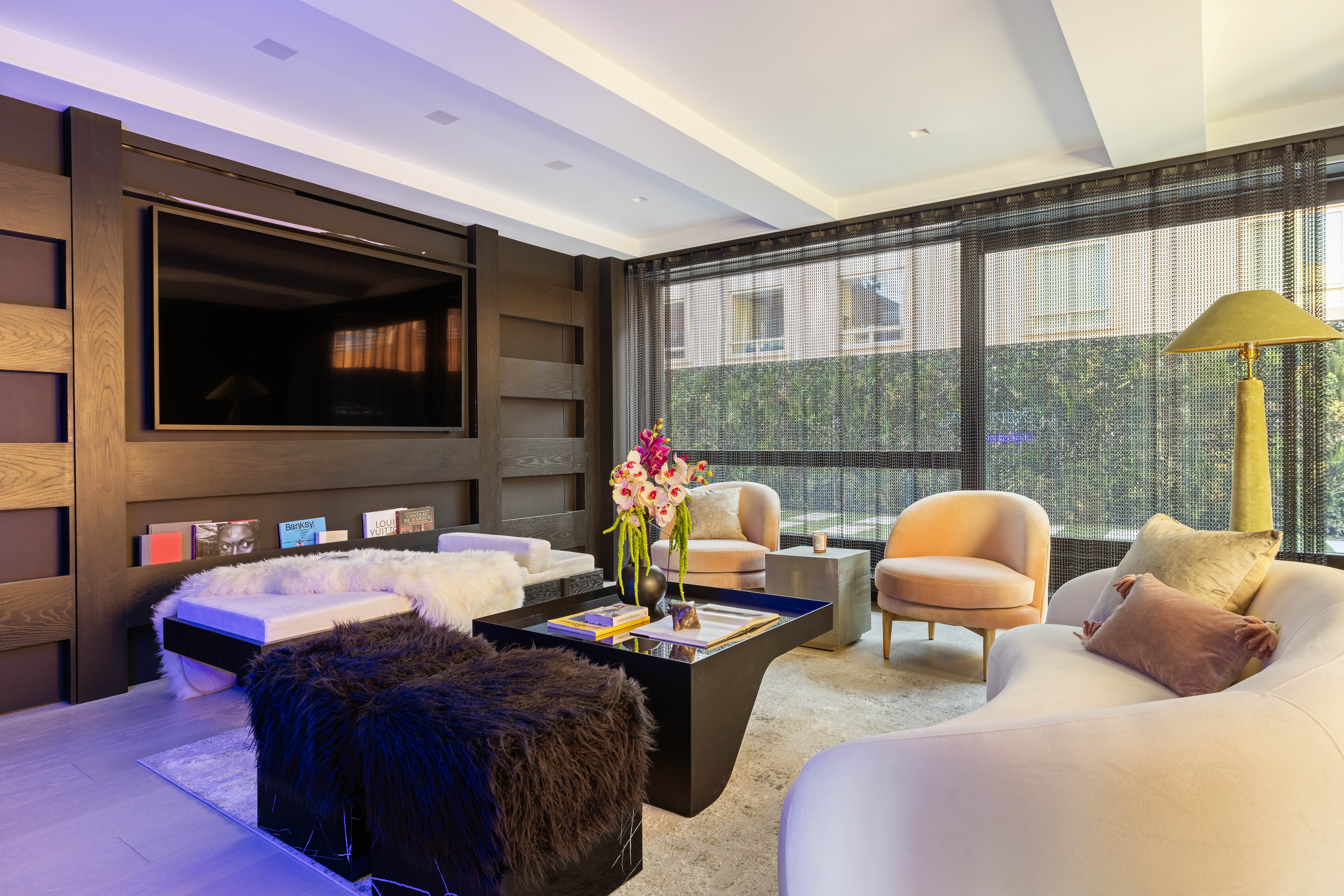 230 Central Park South Manhattan, NY 10019 - Photo 21 of 23 a bedroom with furniture and a flat screen tv