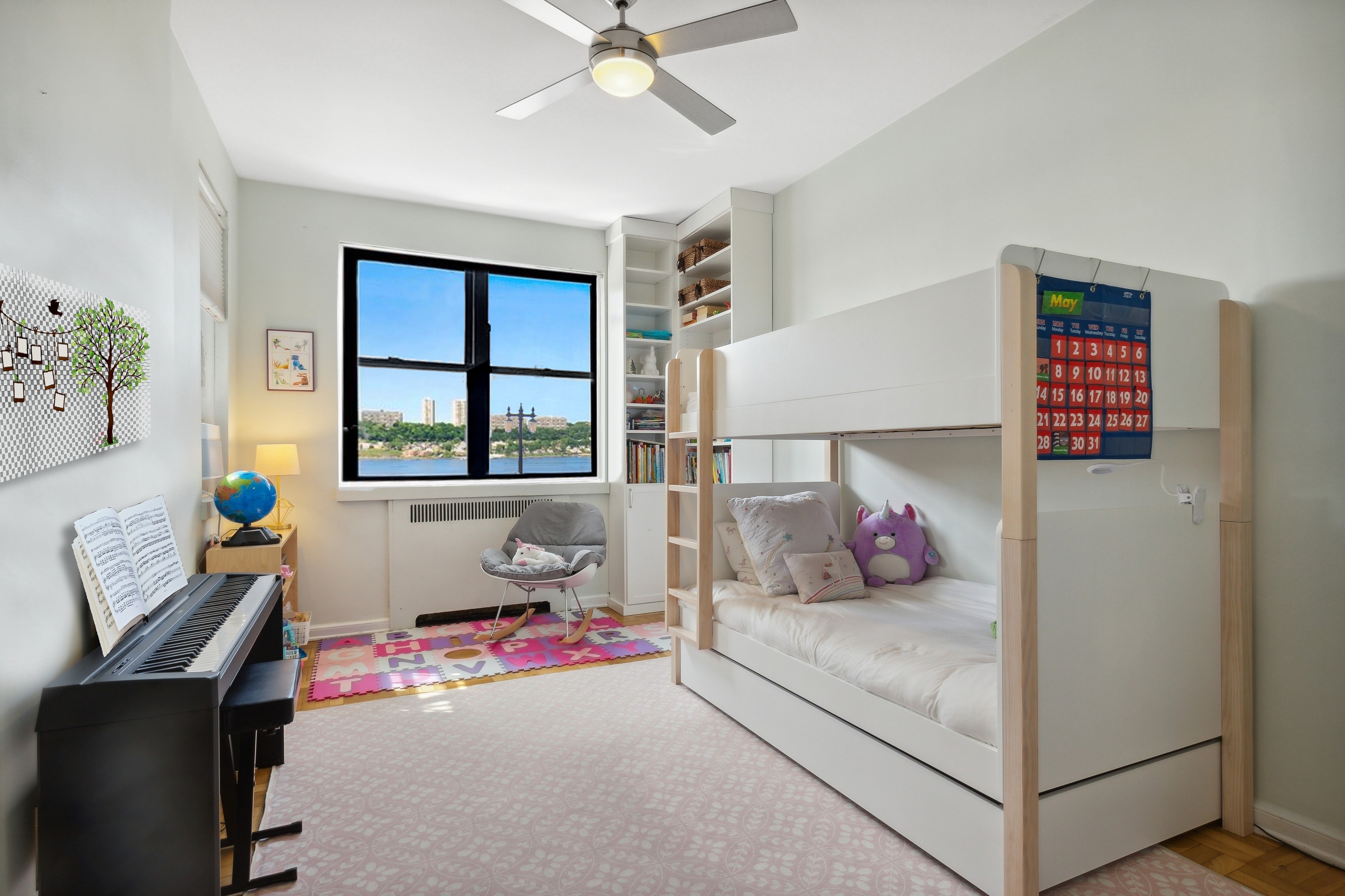 158-18 Riverside Drive West, Unit 2E Manhattan, NY 10032 - Photo 6 of 22 a bedroom with a bed and window