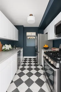 a bedroom with a bed and dresser