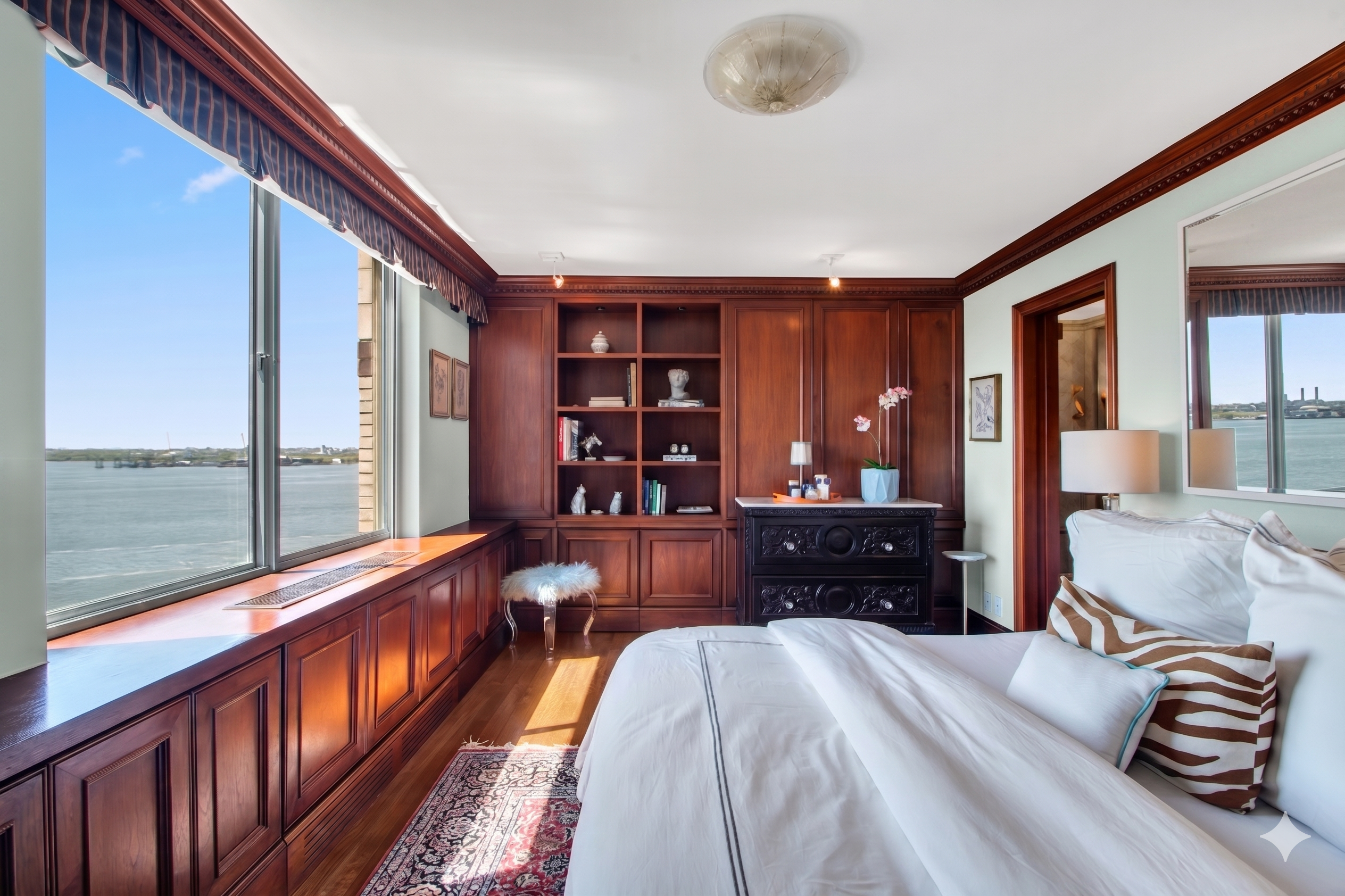 21 South End Avenue, Unit PH1A Manhattan, NY 10280 - Photo 14 of 32 a bedroom with bed and large windows