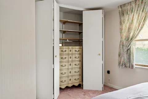 a view of room with walk in closet
