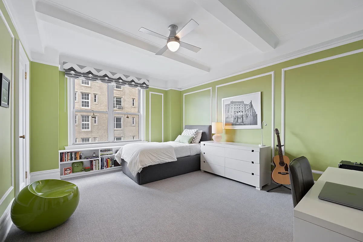 415 Central Park West, Unit 6A Manhattan, NY 10025 - Photo 21 of 25 a spacious bedroom with a bed and a window