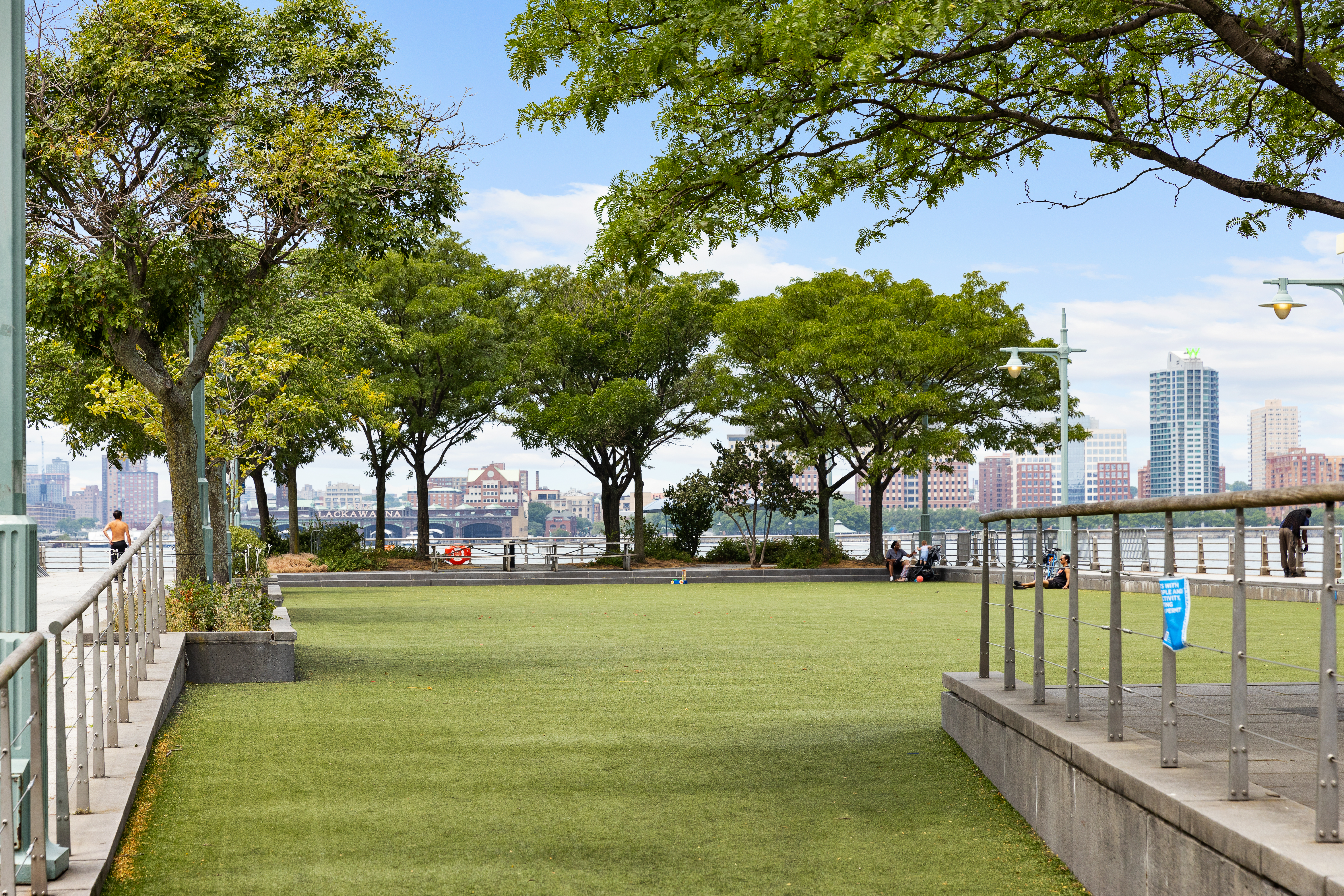167 Perry Street, Unit 4K Manhattan, NY 10014 - Photo 8 of 11 a view of a park with large trees