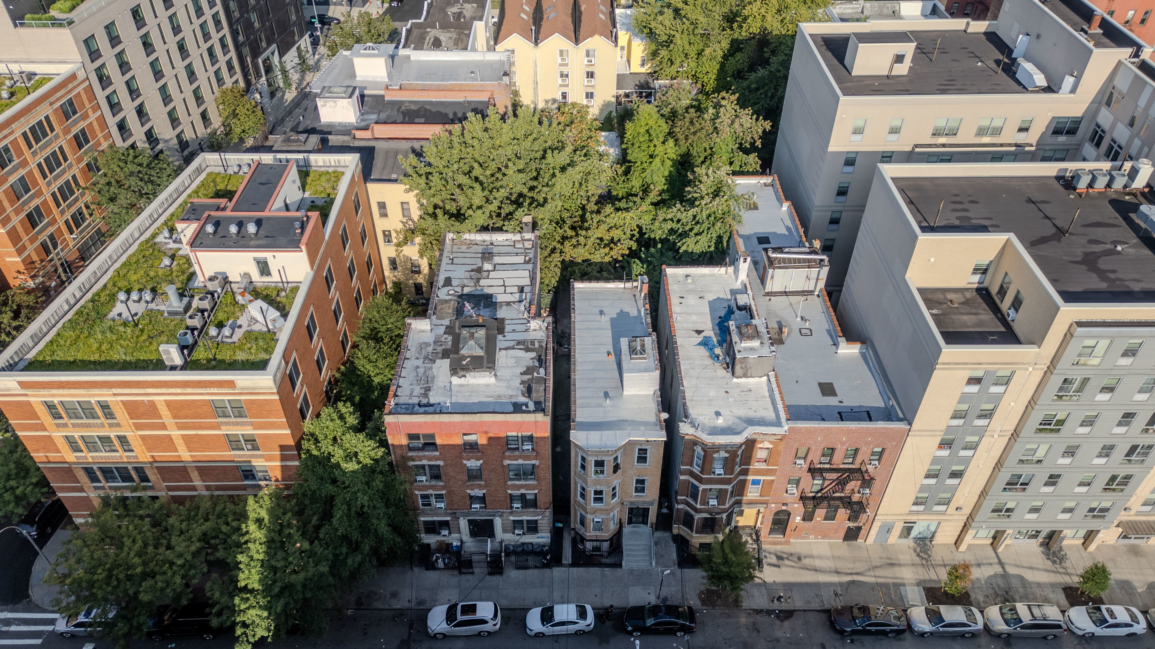2023 Hughes Avenue Bronx, NY 10457 - Photo 30 of 63 an aerial view of residential houses with outdoor space