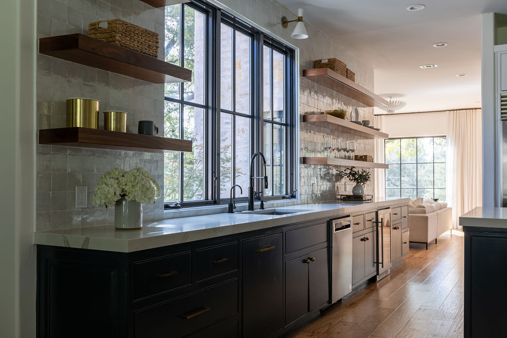 400 Inwood Road Austin, TX 78746 - Photo 10 of 43 a kitchen with stainless steel appliances a sink and a window