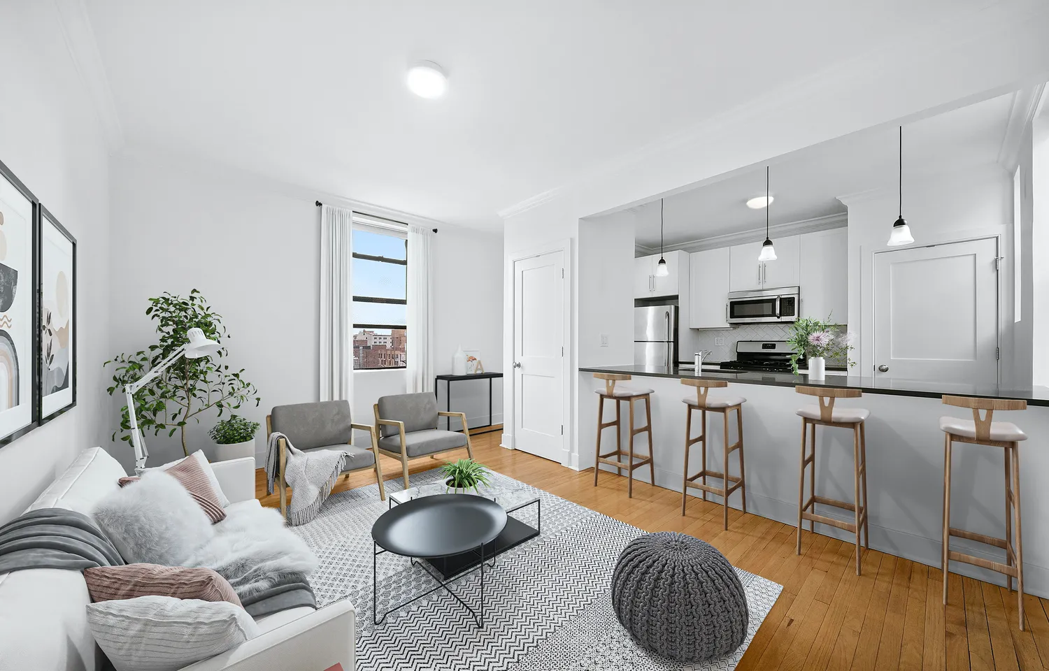 a living room with furniture and wooden floor