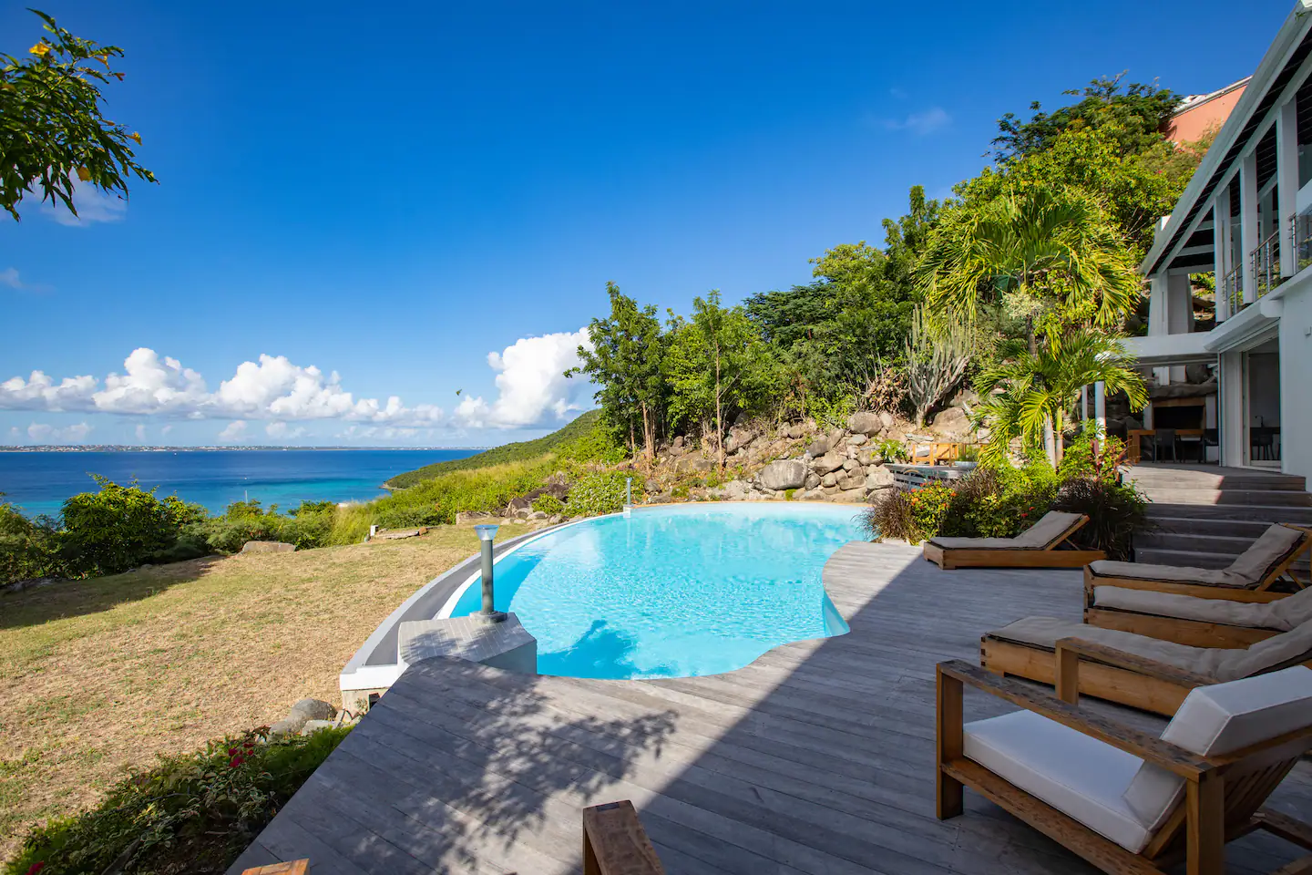 Anse Marcel St. Martin, undefined 97150 - Photo 14 of 15 a view of a backyard with plants and lake view