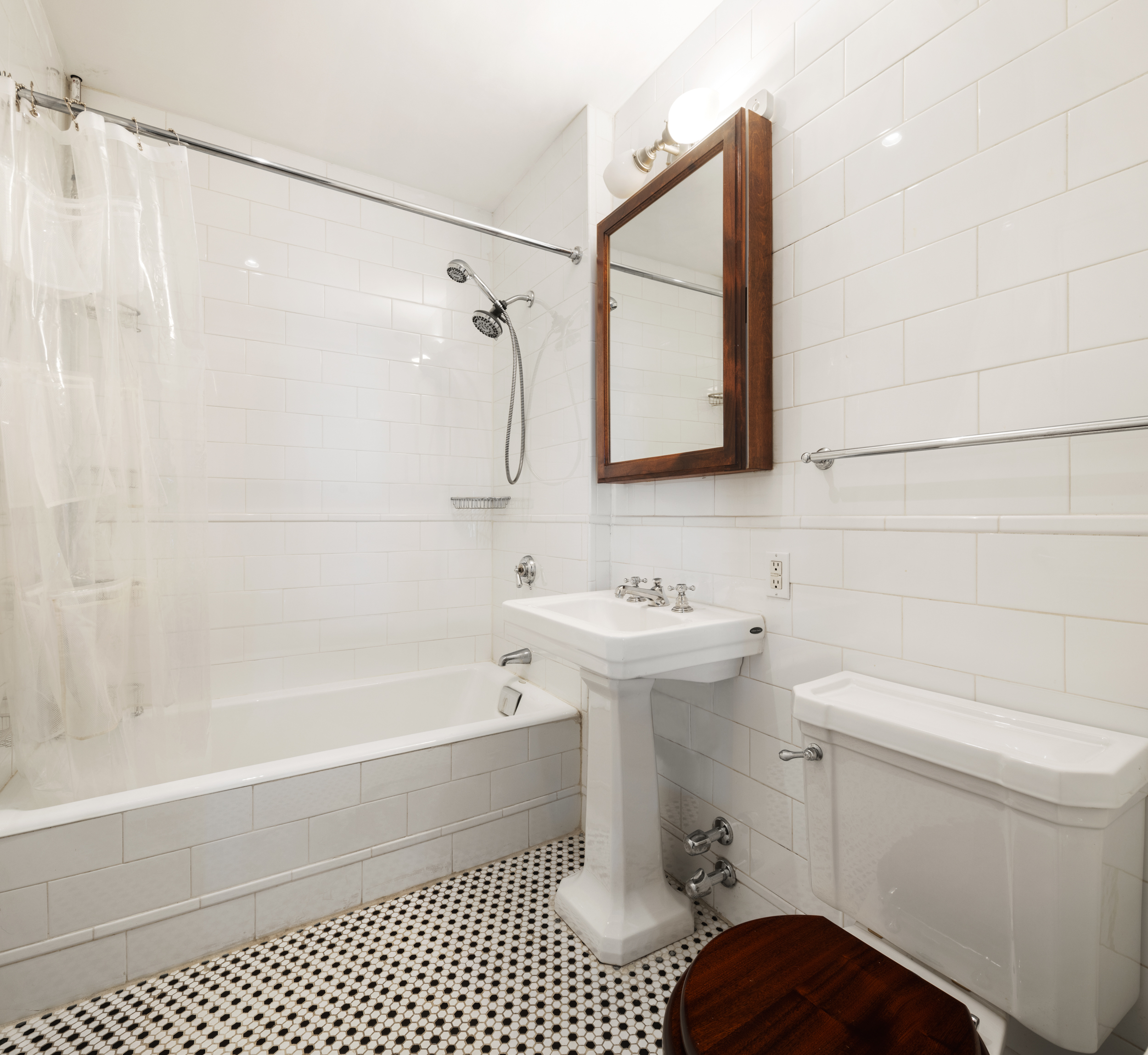 62 Beach Street, Unit 5E Manhattan, NY 10013 - Photo 13 of 15 a bathroom with a sink toilet and shower