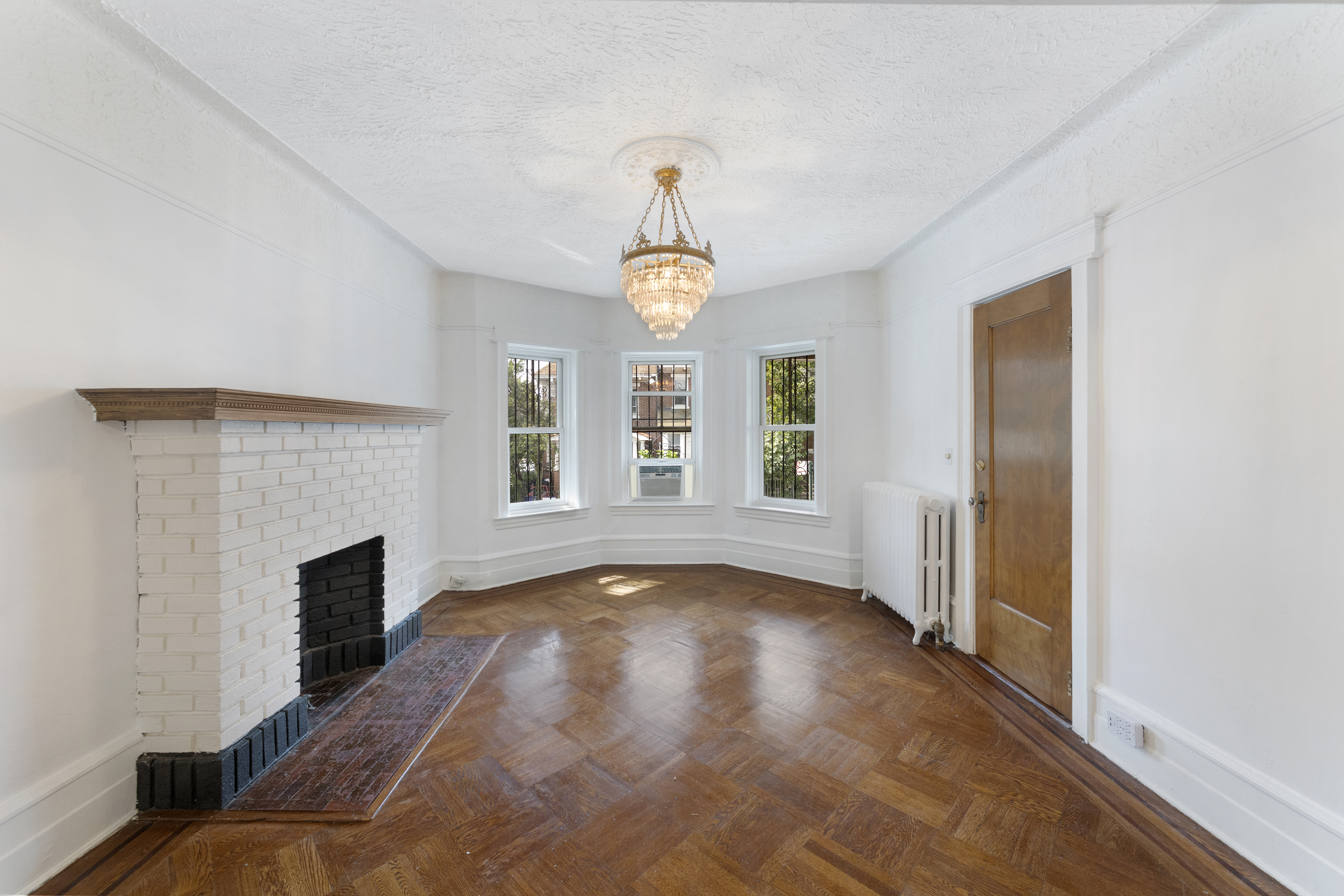 57 Hendrix Street, Unit 1 Brooklyn, NY 11207 - Photo 10 of 12 a view of empty room with front door