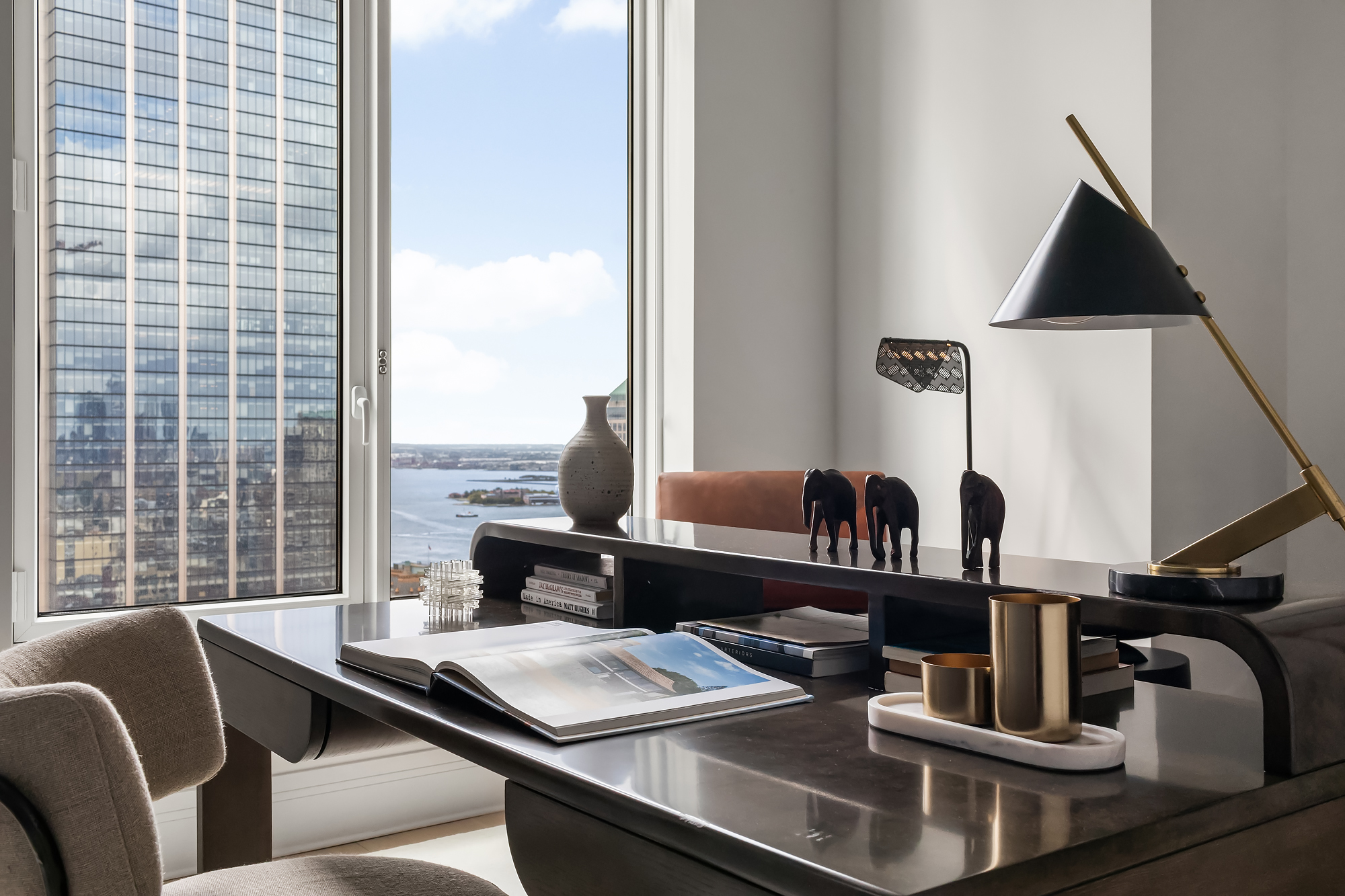 30 Park Place, Unit 50D Manhattan, NY 10007 - Photo 9 of 17 a view of a workspace with furniture and window