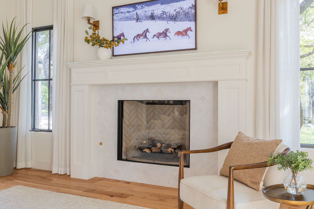 400 Inwood Road Austin, TX 78746 - Photo 8 of 43 a living room with furniture and a fireplace