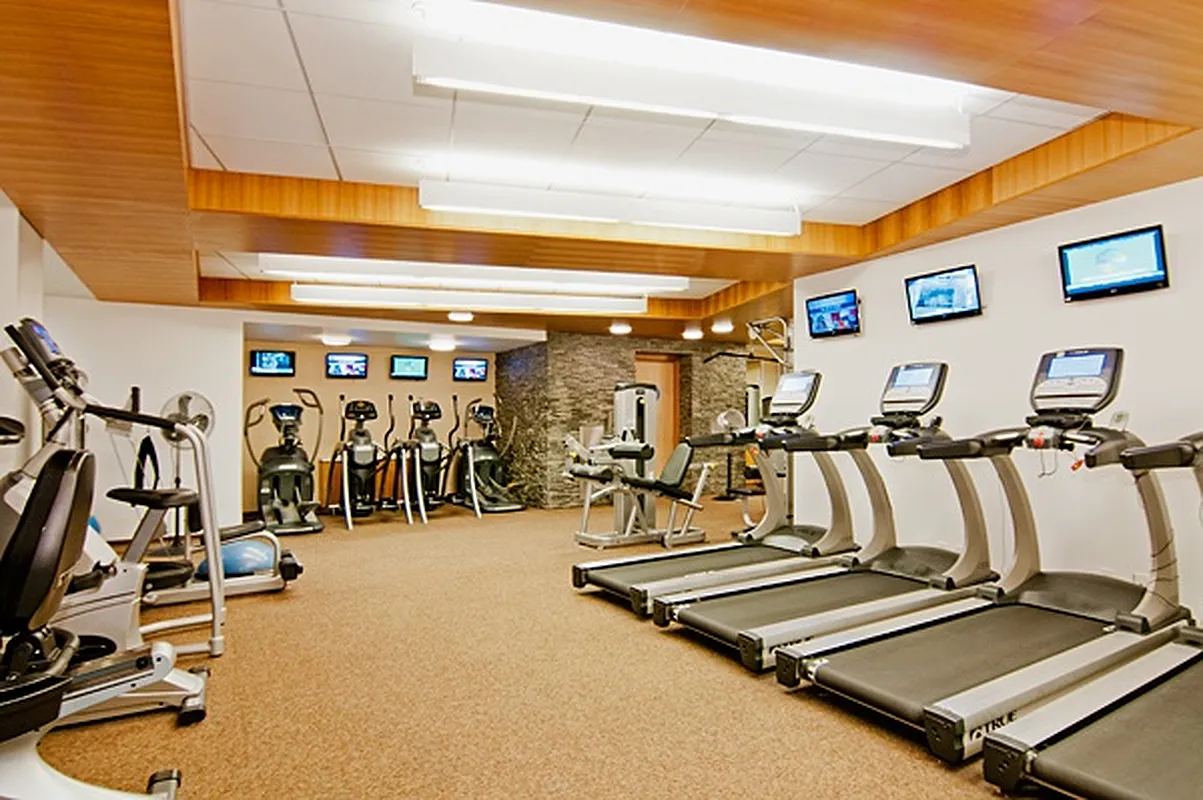 99 John Street, Unit 819 Manhattan, NY 10038 - Photo 9 of 20 a view of a room with gym equipment