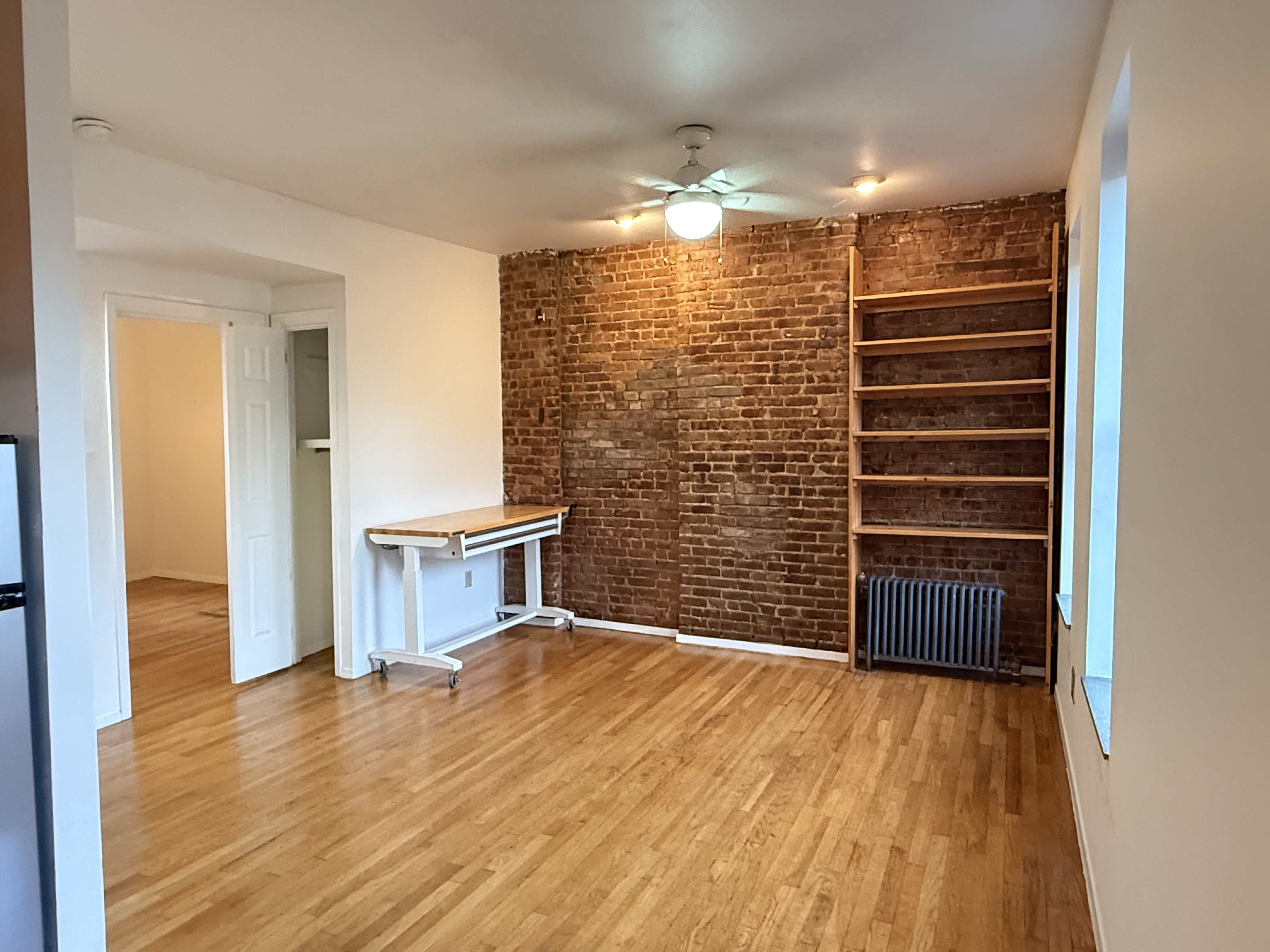 1672 Park Avenue, Unit 4A Manhattan, NY 10035 - Photo 4 of 11 a view of empty room with wooden floor