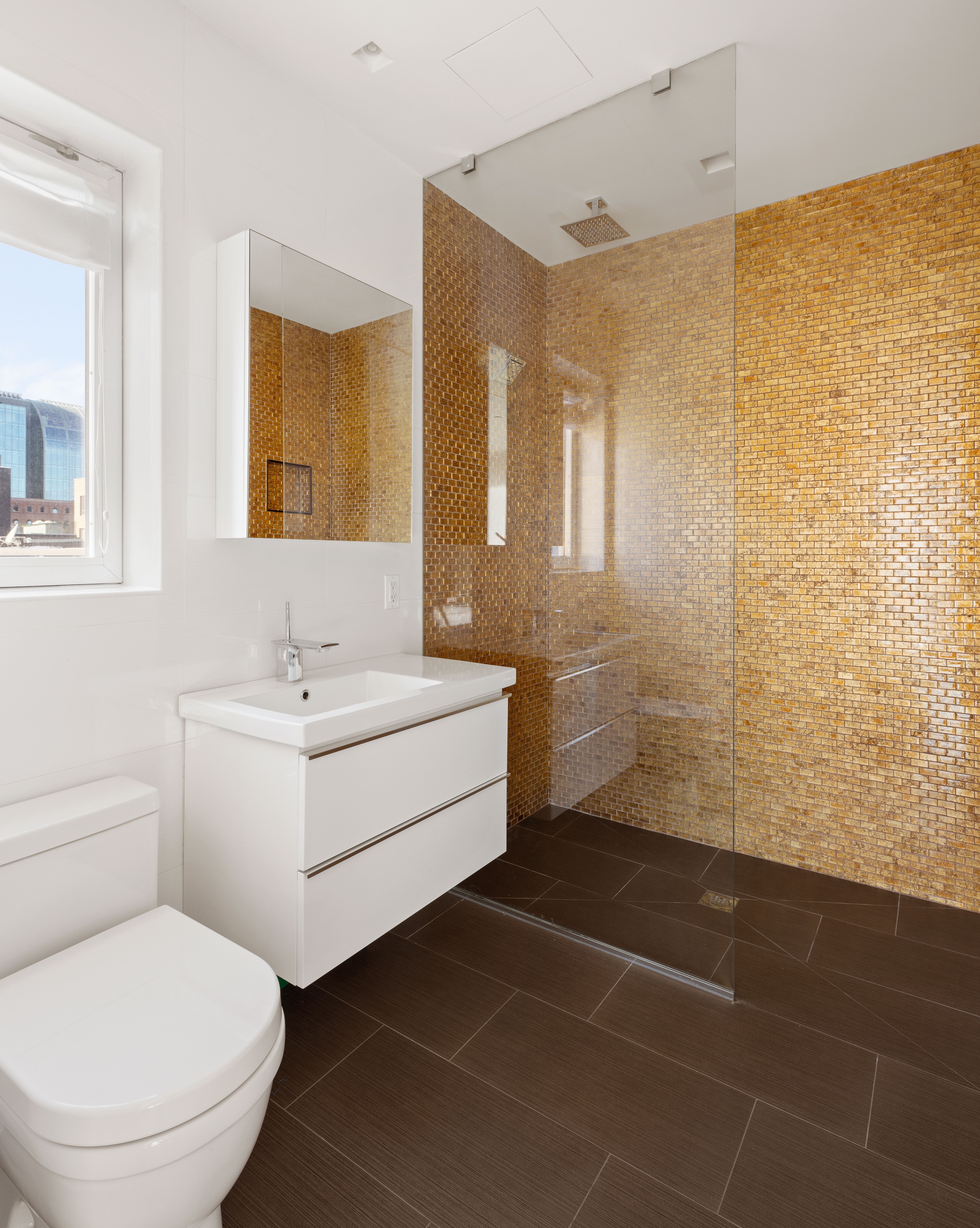 78 South 3rd Street, Unit 3 Brooklyn, NY 11249 - Photo 12 of 17 a bathroom with a sink toilet and shower