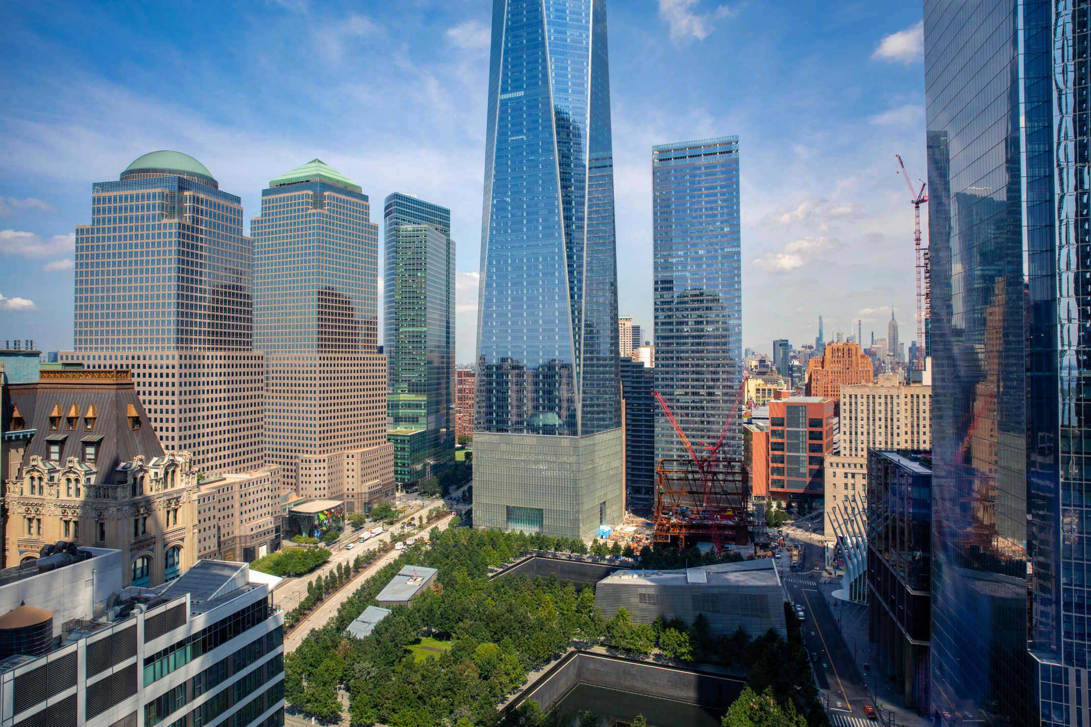 123 Washington Street, Unit 30F Manhattan, NY 10006 - Photo 6 of 11 a view of a city with tall buildings