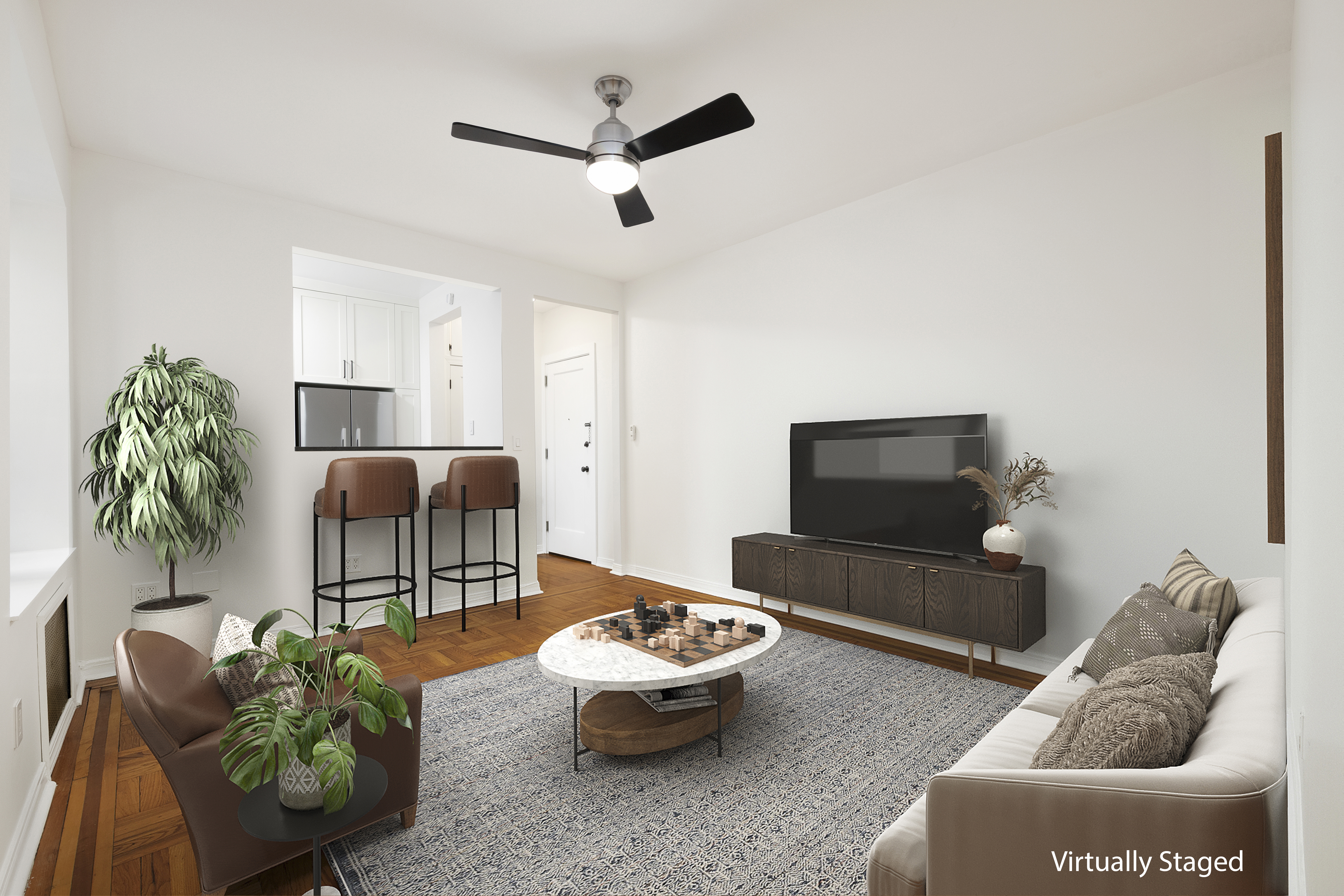67 Morton Street, Unit 2A Manhattan, NY 10014 - Photo 3 of 10 a living room with furniture and a potted plant