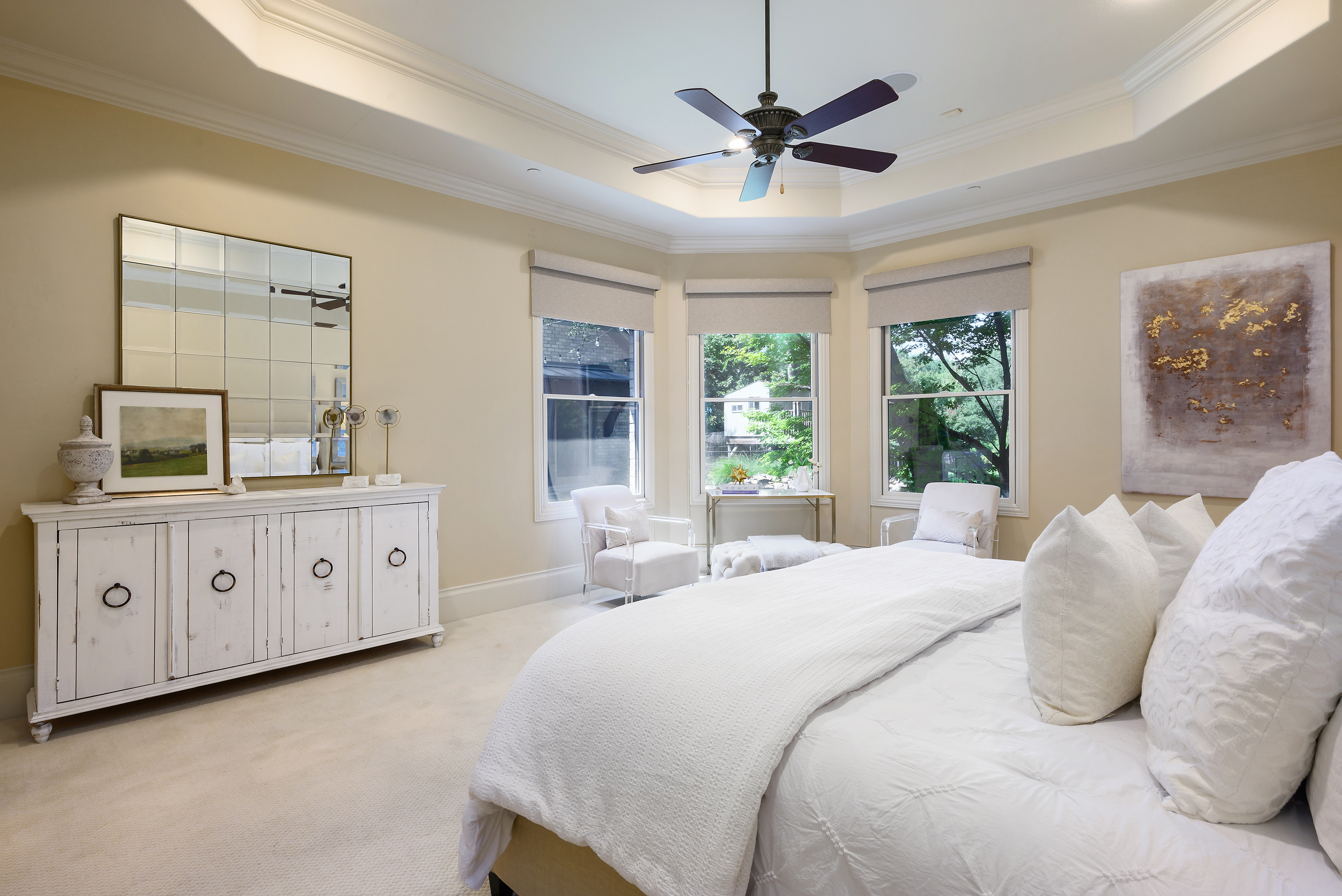 11503 West Ricks Circle Dallas, TX 75230 - Photo 22 of 39 a spacious bedroom with a large bed and a window
