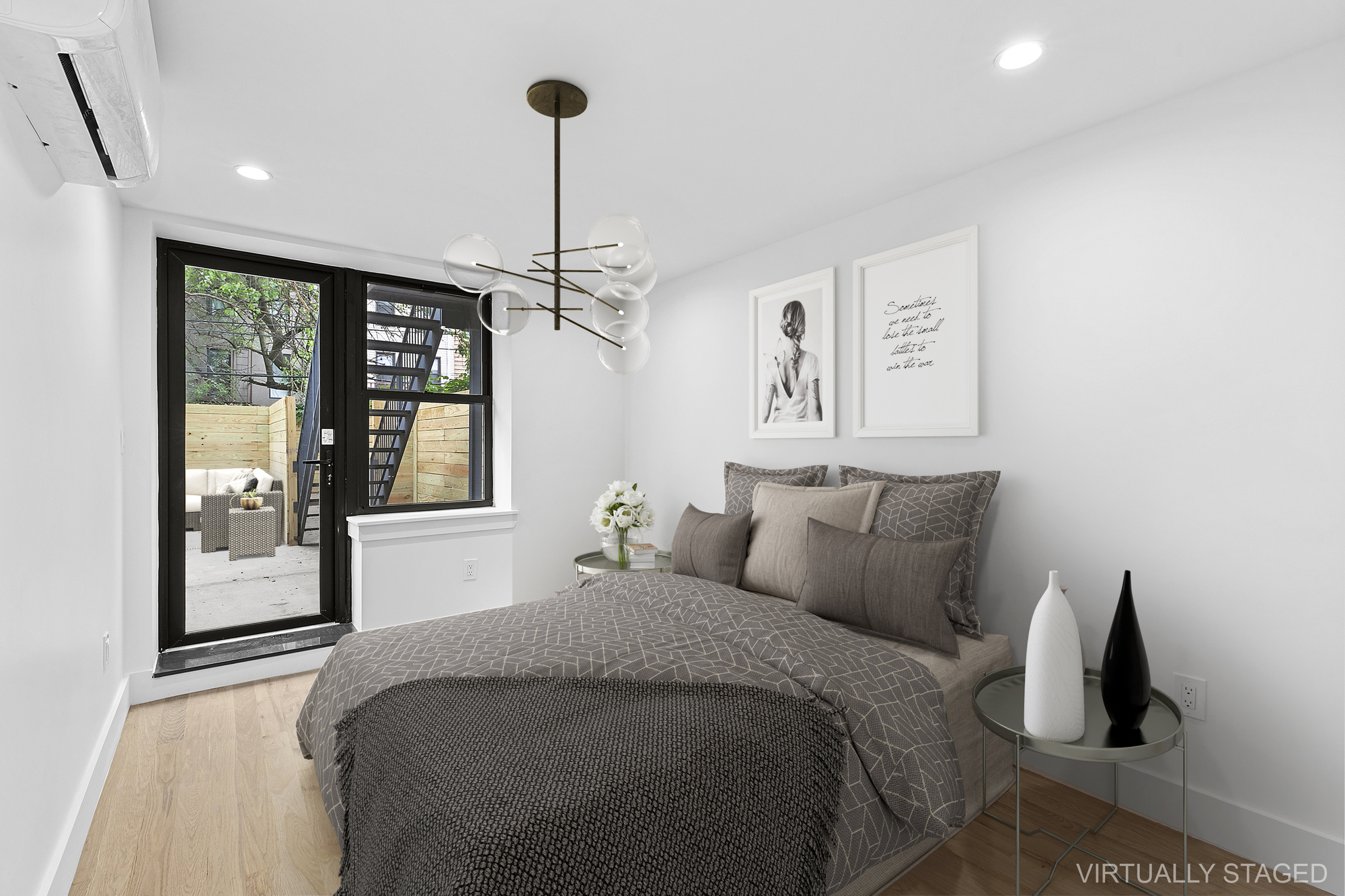 162 Cornelia Street, Unit 1 Brooklyn, NY 11221 - Photo 5 of 11 a bedroom with a bed and window