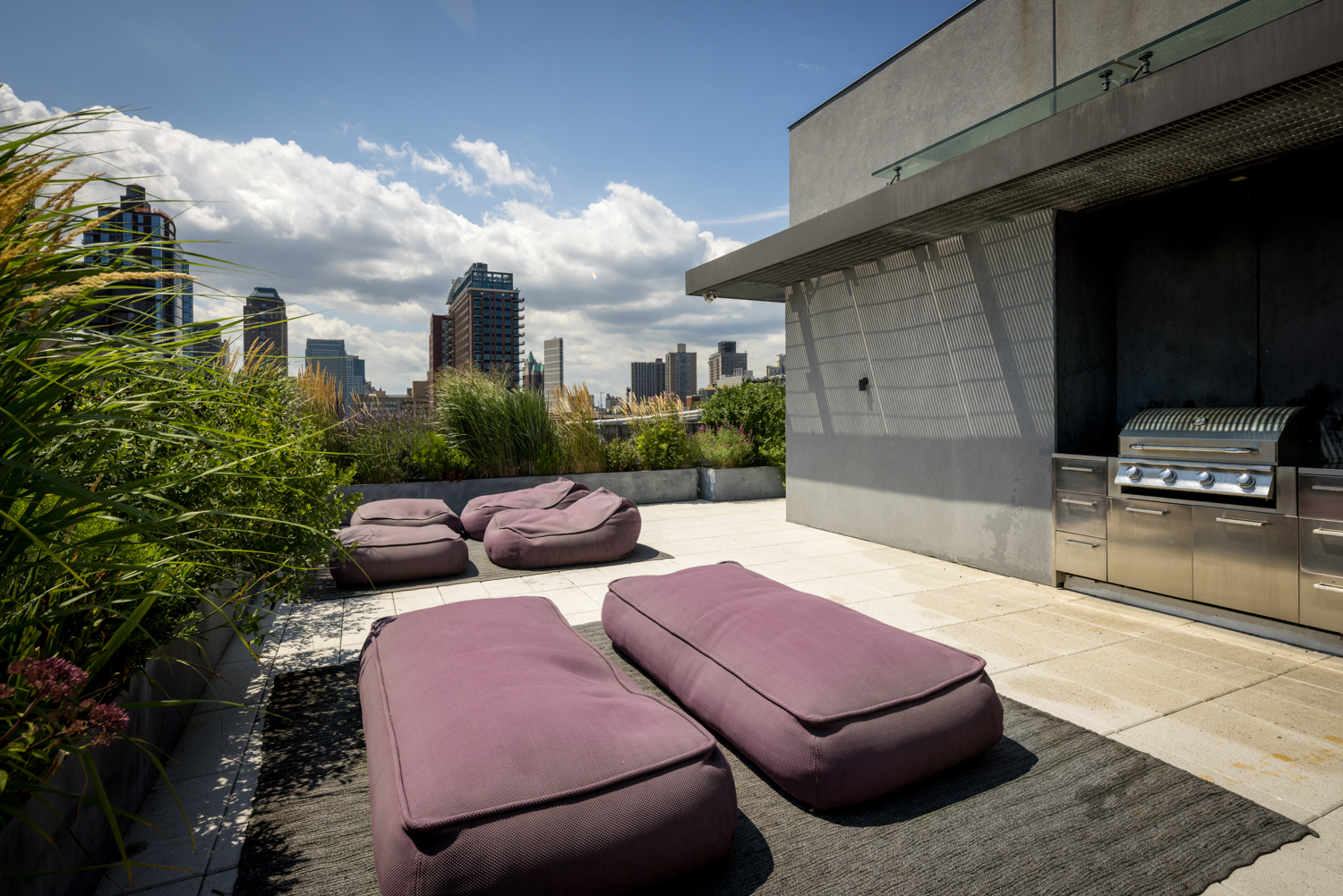 1 John Street, Unit 3C Brooklyn, NY 11201 - Photo 14 of 16 a view of a patio with couches table and chairs and potted plants