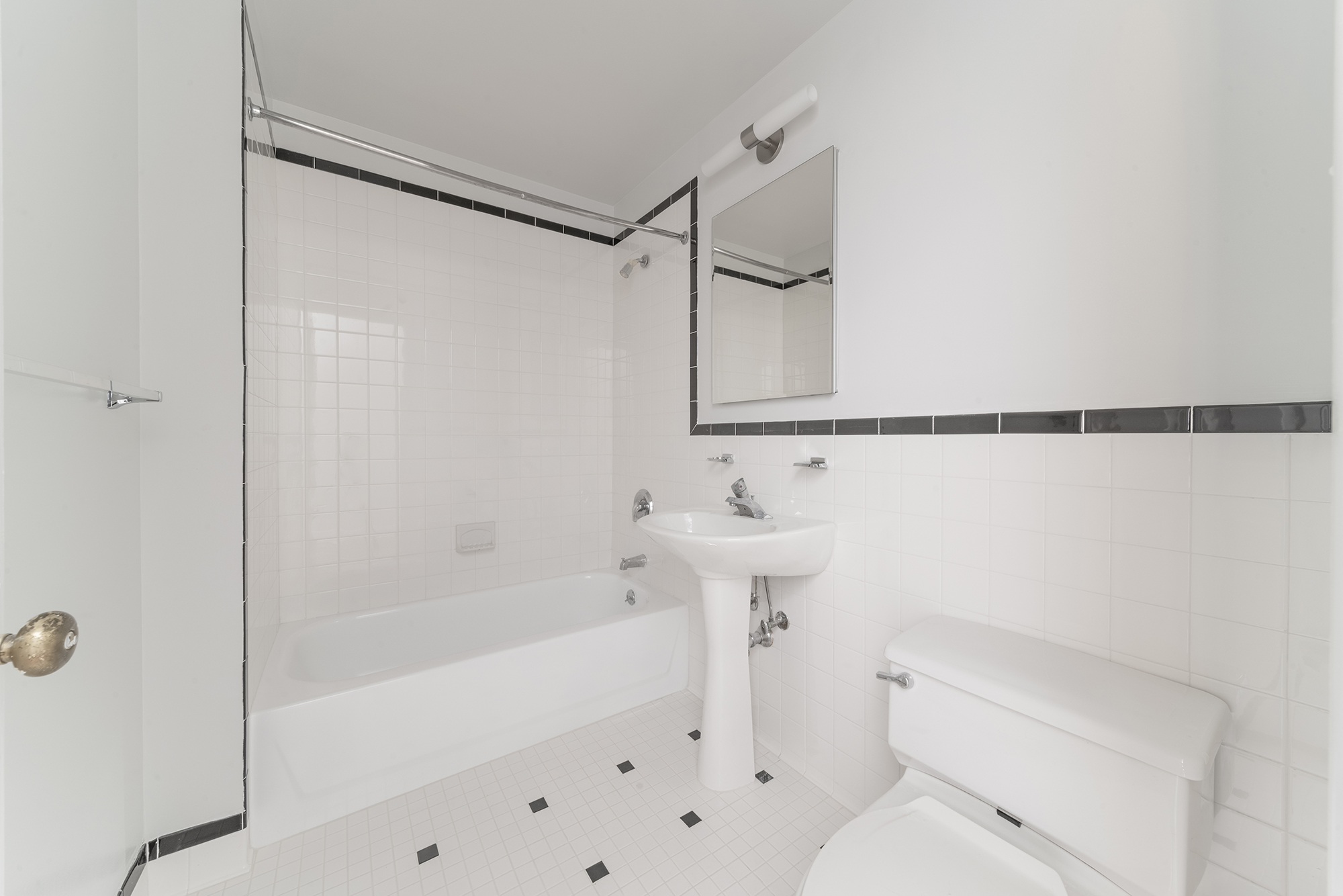 7 Mt Morris Park West, Unit D Manhattan, NY 10027 - Photo 13 of 16 a bathroom with a shower a toilet and sink