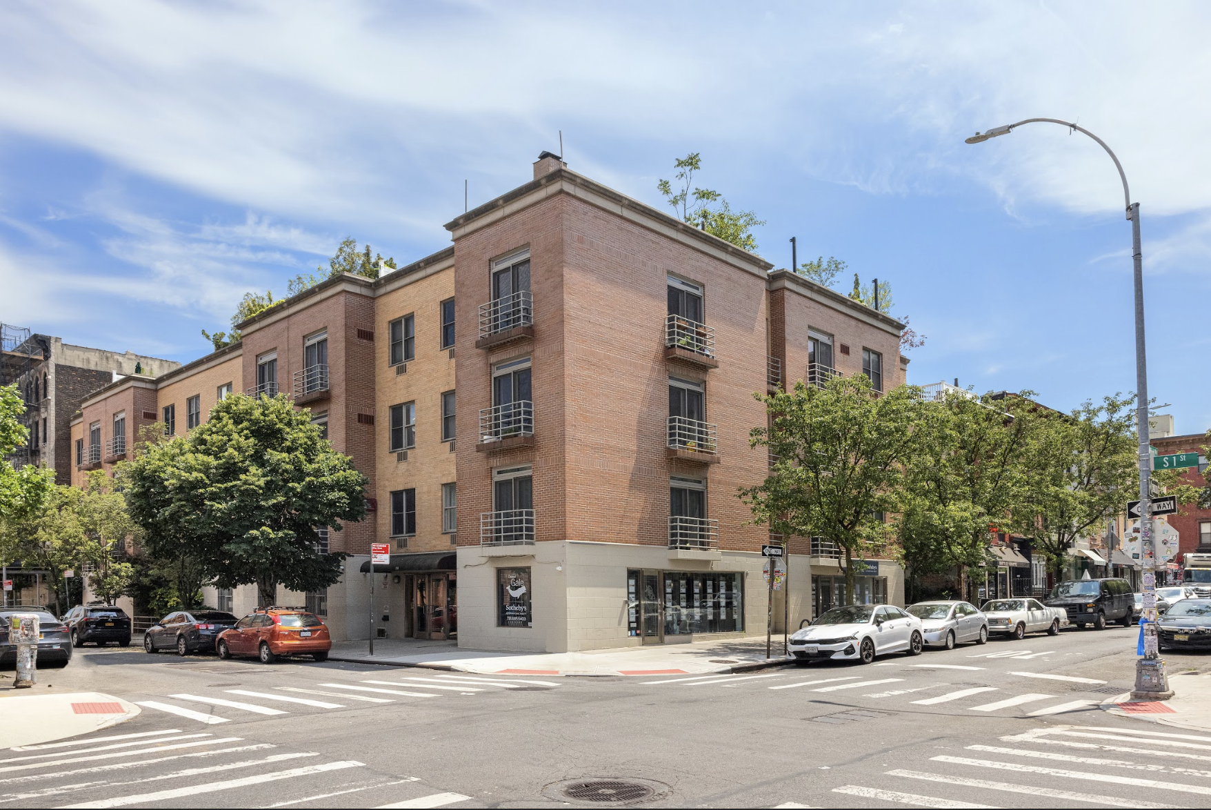 150 South 1st Street, Unit 2K Brooklyn, NY 11211 - Photo 11 of 12 a view of a building and a street