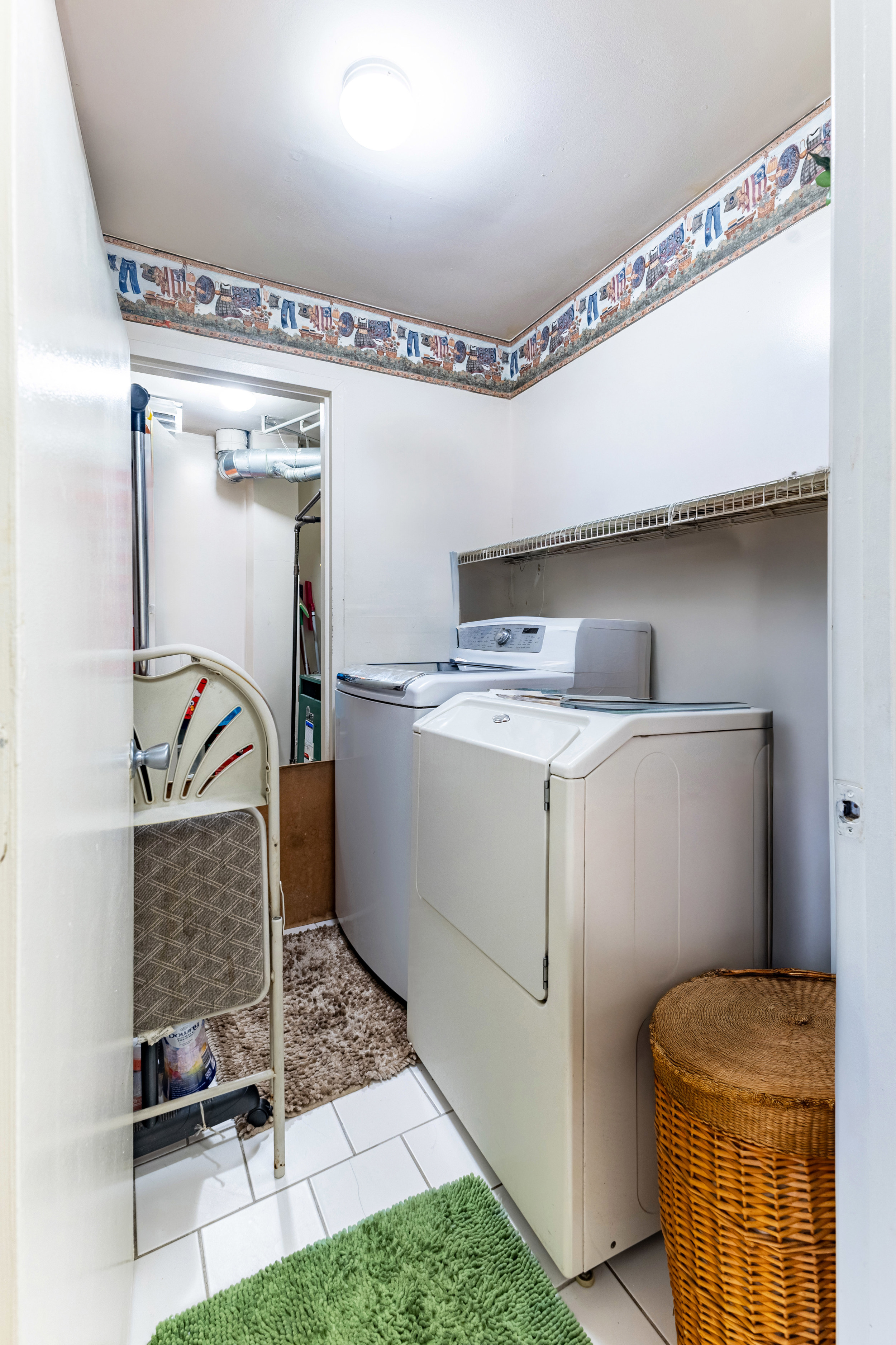 669 Dekalb Avenue Brooklyn, NY 11216 - Photo 16 of 21 a utility room with dryer and washer