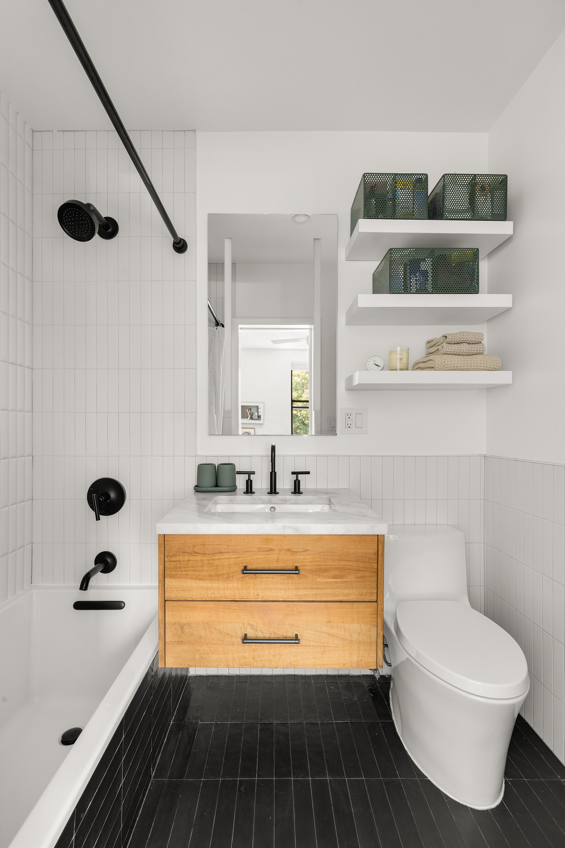 115 Eastern Parkway, Unit 3H Brooklyn, NY 11238 - Photo 5 of 12 a bathroom with a sink and a mirror