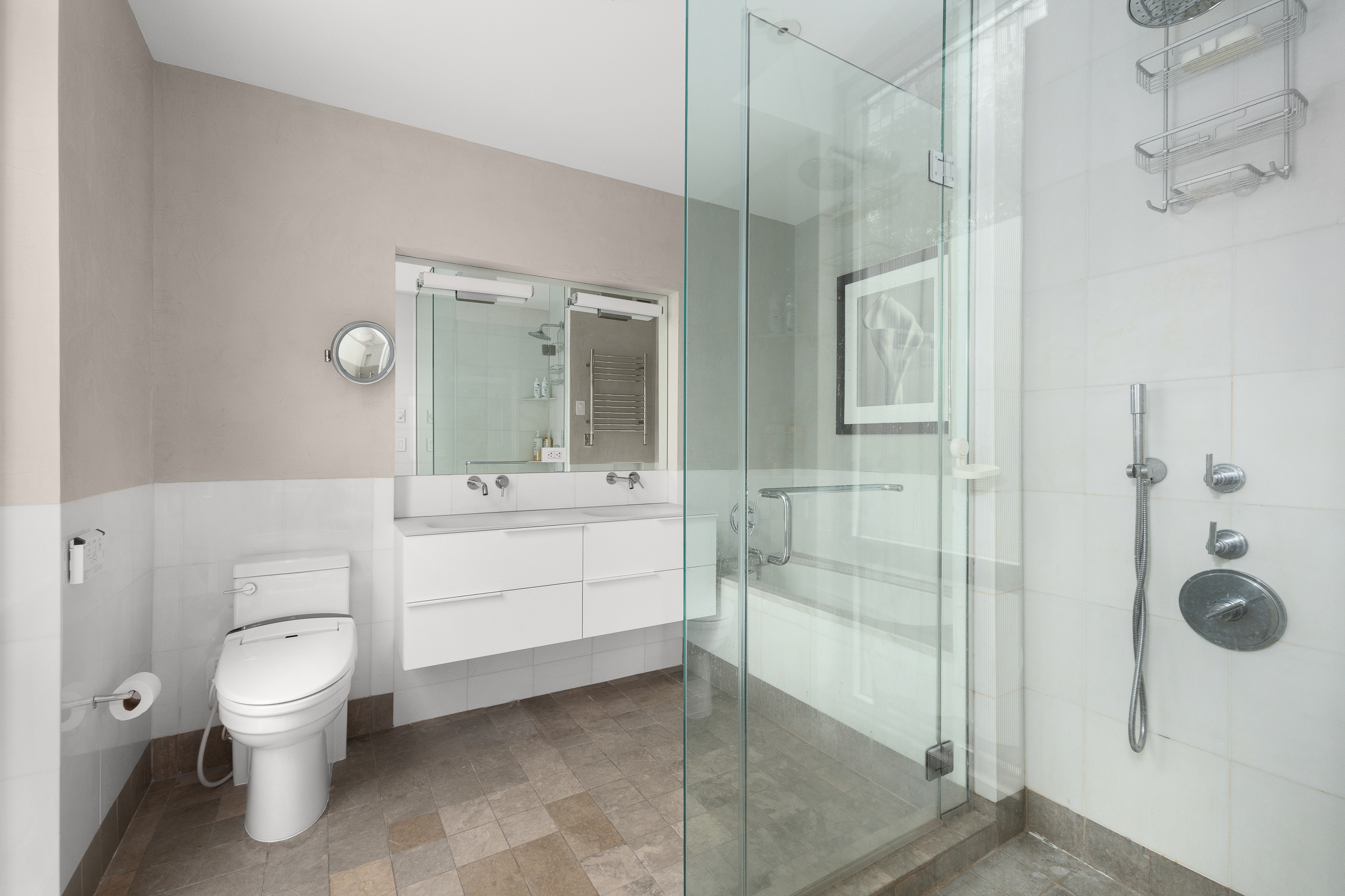 10 West End Avenue, Unit 4B Manhattan, NY 10023 - Photo 8 of 12 a bathroom with a sink a toilet and shower