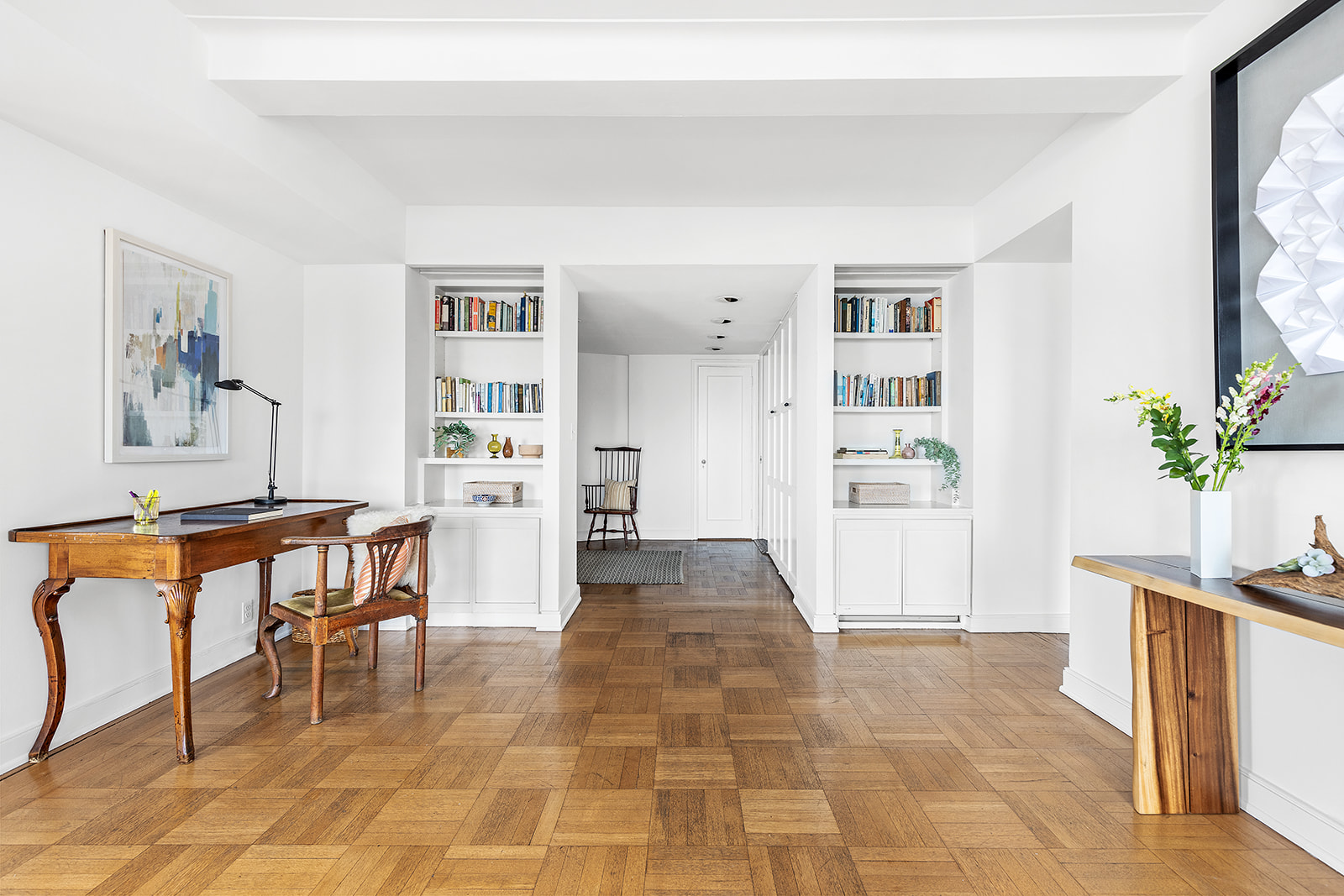 110-118 Riverside Drive, Unit 15A Manhattan, NY 10024 - Photo 11 of 17 a living room with stainless steel appliances furniture a rug and a window