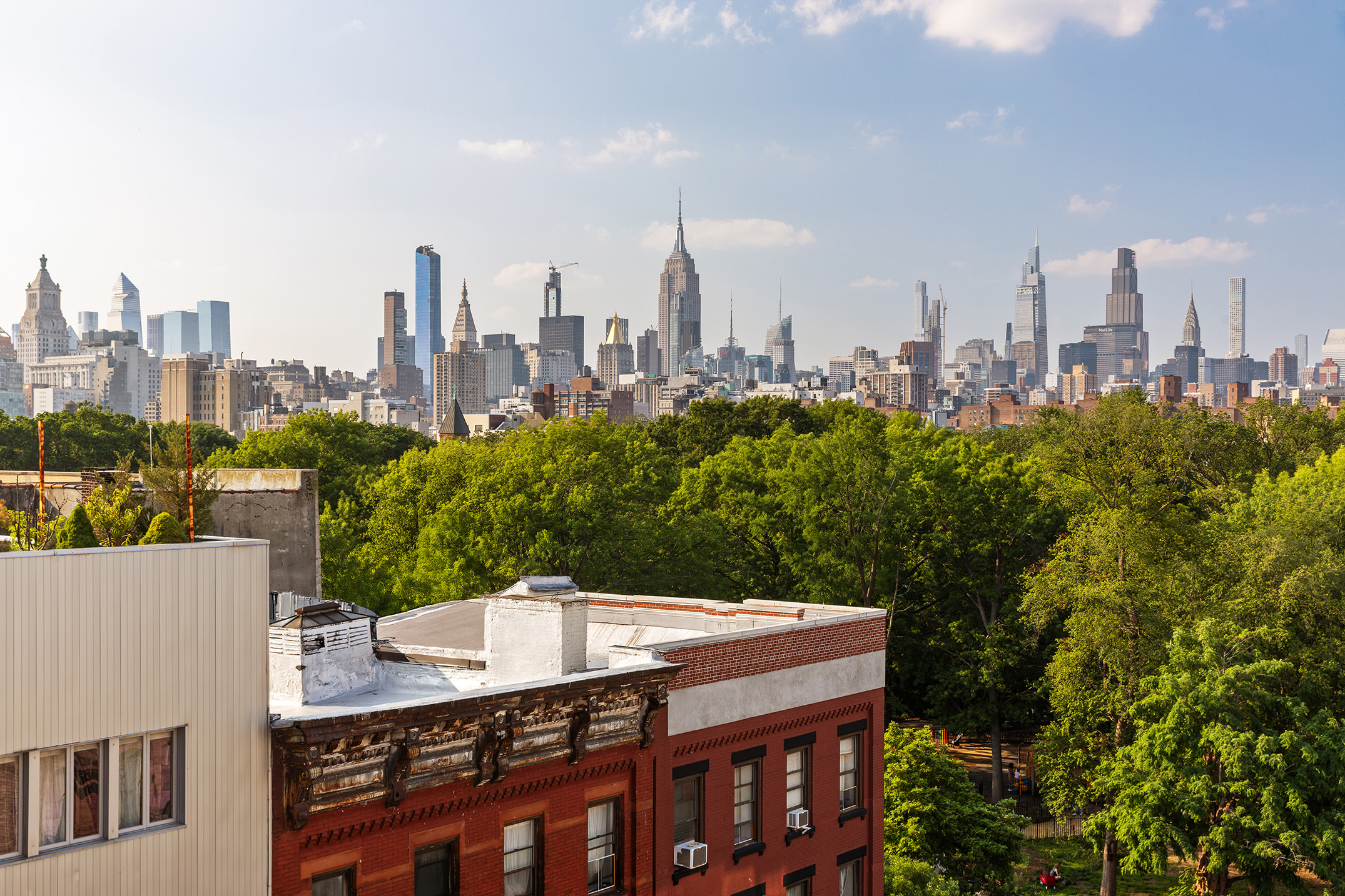99 Avenue B, Unit PHDE Manhattan, NY 10009 - Photo 17 of 18 a view of a city with tall buildings