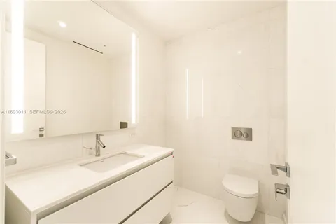 a bathroom with a sink and a toilet